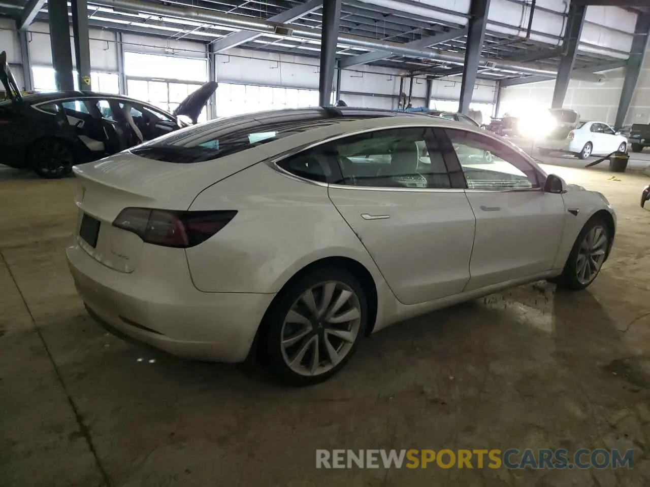 3 Photograph of a damaged car 5YJ3E1EB8LF621393 TESLA MODEL 3 2020