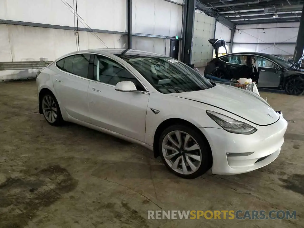 4 Photograph of a damaged car 5YJ3E1EB8LF621393 TESLA MODEL 3 2020