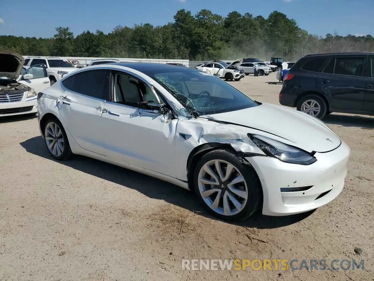 4 Photograph of a damaged car 5YJ3E1EB8LF622723 TESLA MODEL 3 2020