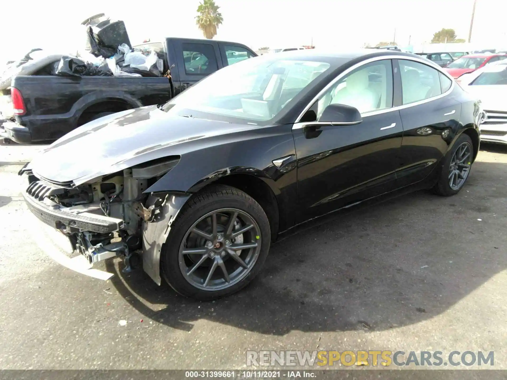 2 Photograph of a damaged car 5YJ3E1EB8LF638971 TESLA MODEL 3 2020