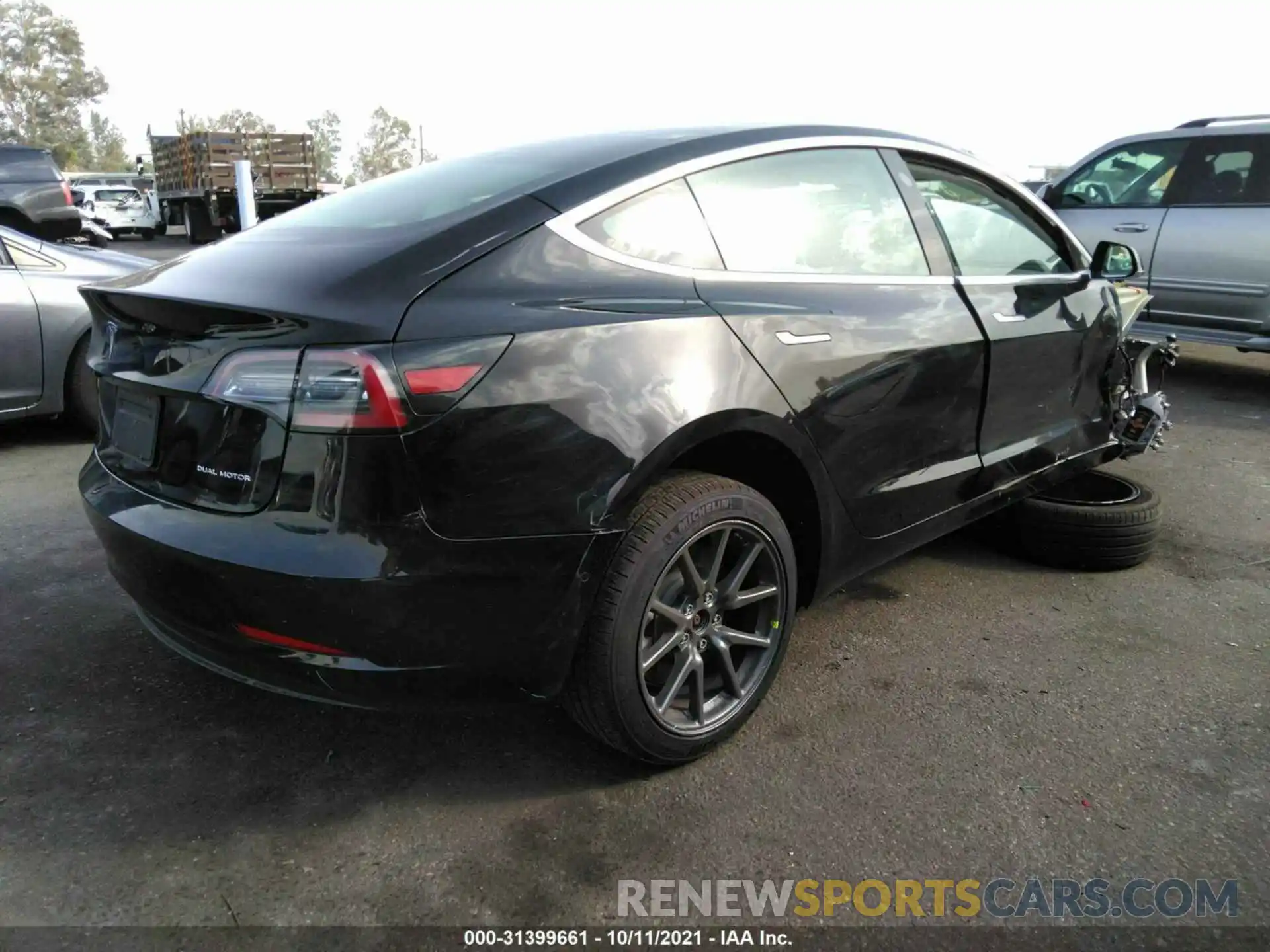 4 Photograph of a damaged car 5YJ3E1EB8LF638971 TESLA MODEL 3 2020