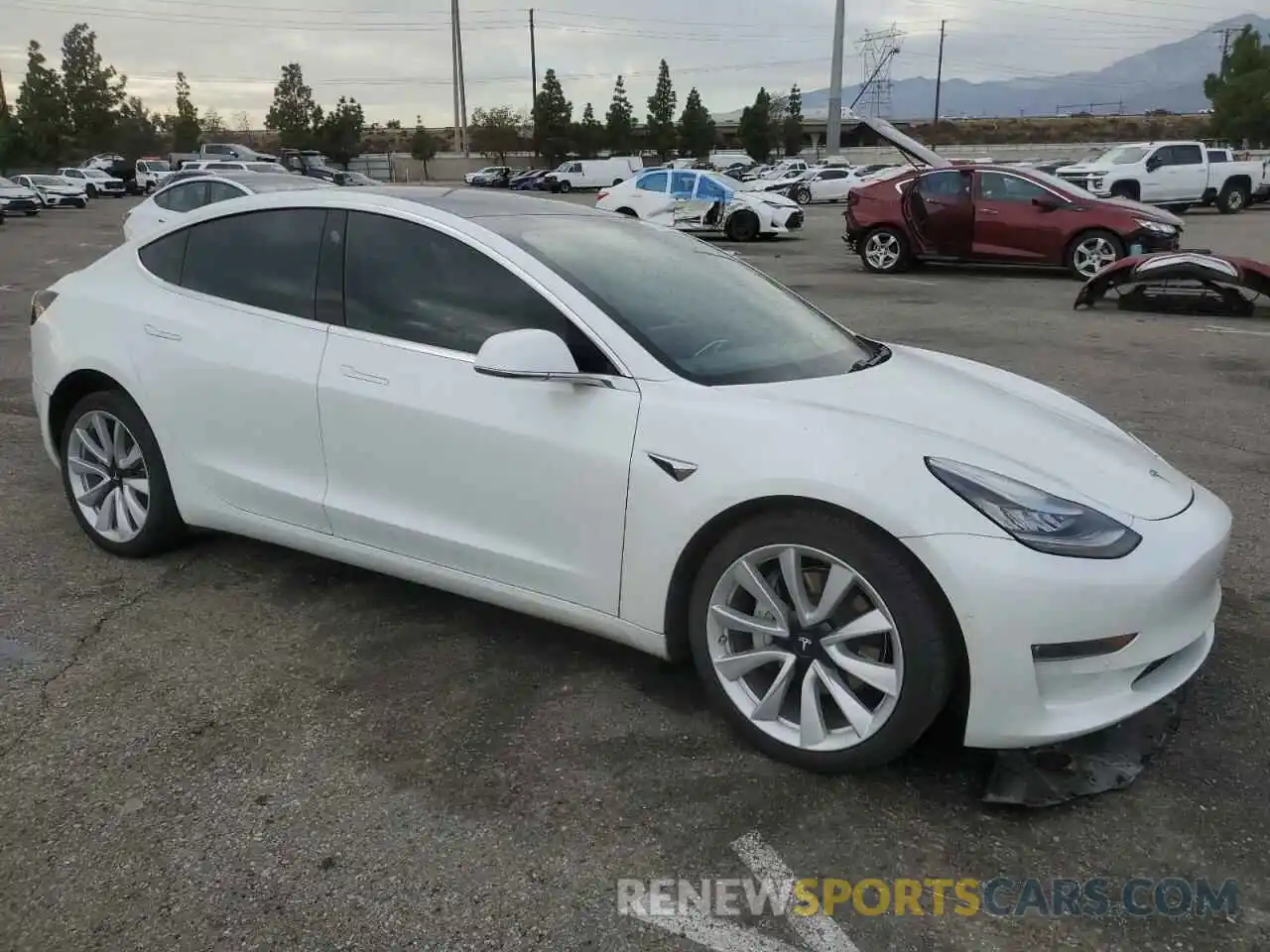 4 Photograph of a damaged car 5YJ3E1EB8LF650540 TESLA MODEL 3 2020