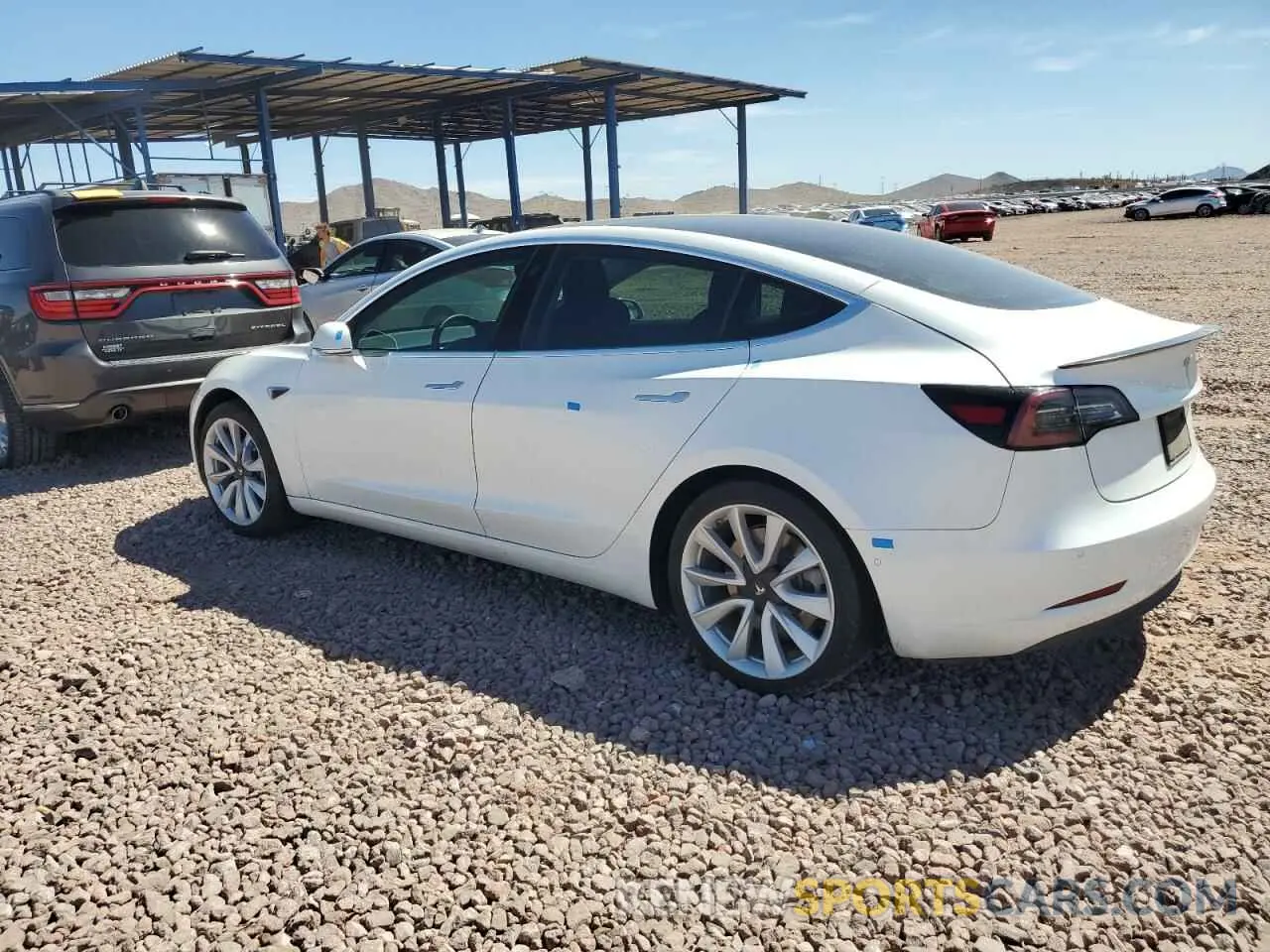 2 Photograph of a damaged car 5YJ3E1EB8LF712308 TESLA MODEL 3 2020