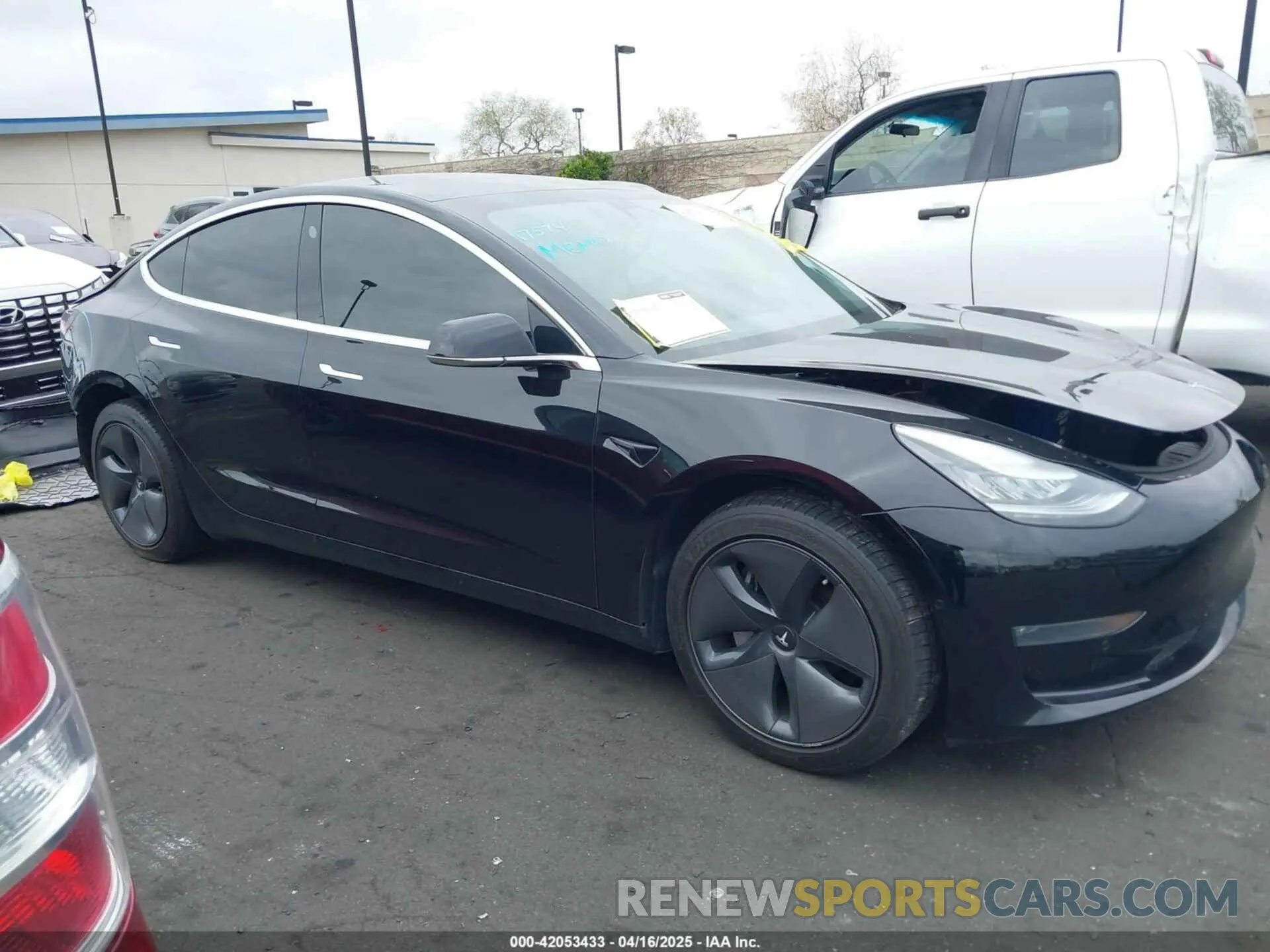 14 Photograph of a damaged car 5YJ3E1EB8LF790197 TESLA MODEL 3 2020