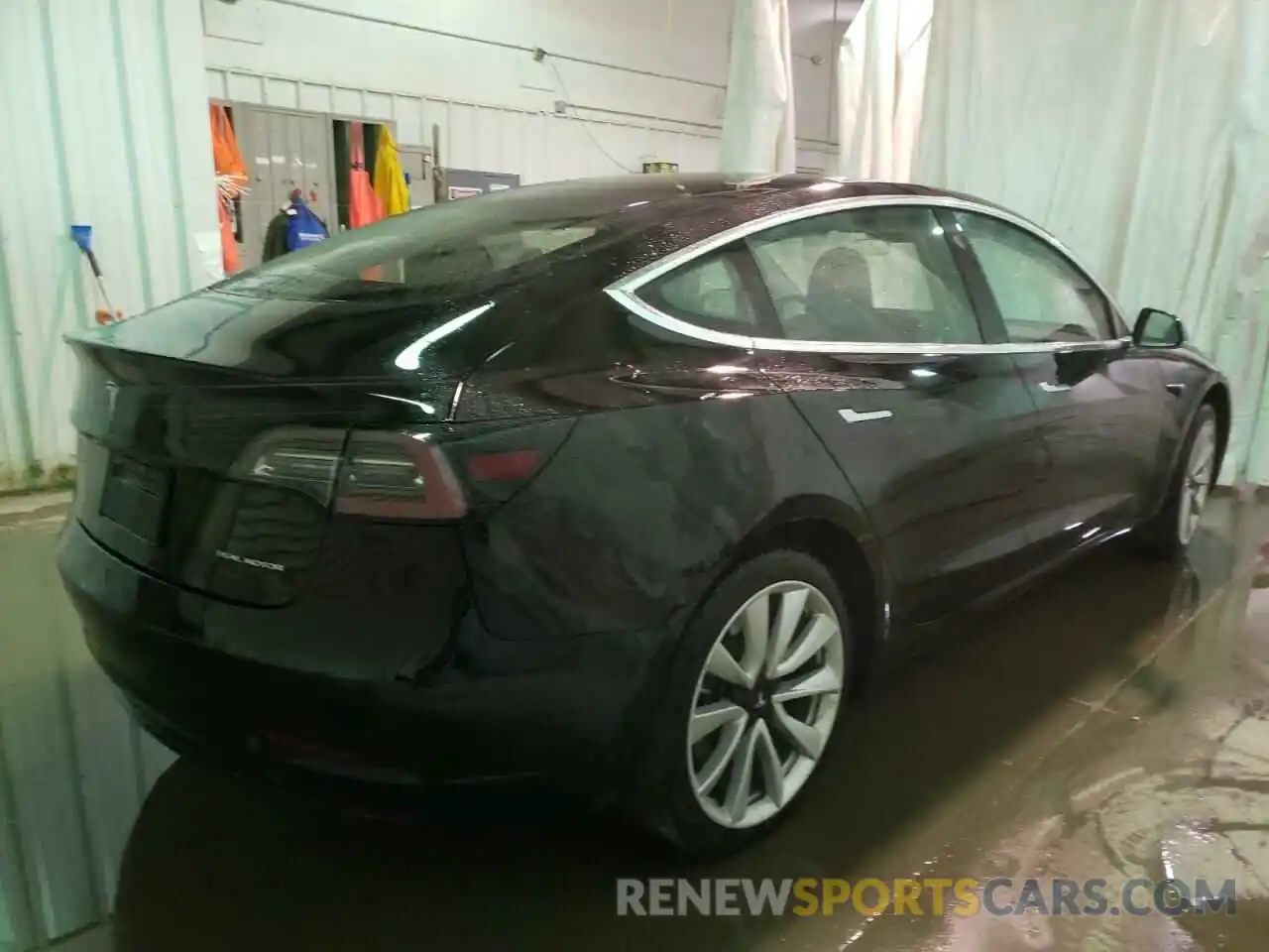 4 Photograph of a damaged car 5YJ3E1EB8LF795285 TESLA MODEL 3 2020