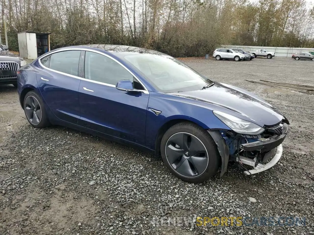 4 Photograph of a damaged car 5YJ3E1EB8LF800601 TESLA MODEL 3 2020