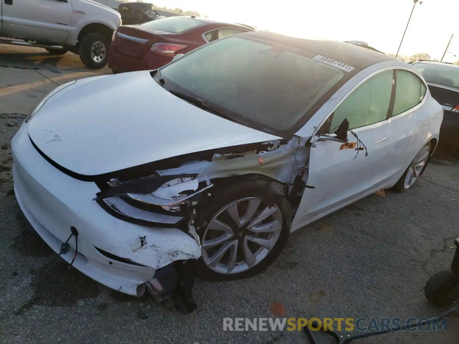 2 Photograph of a damaged car 5YJ3E1EB9LF589070 TESLA MODEL 3 2020