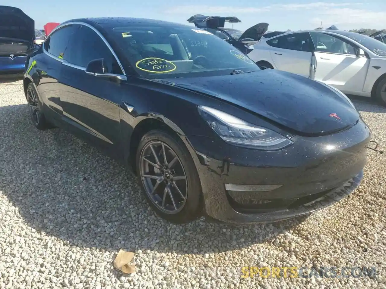 1 Photograph of a damaged car 5YJ3E1EB9LF599579 TESLA MODEL 3 2020