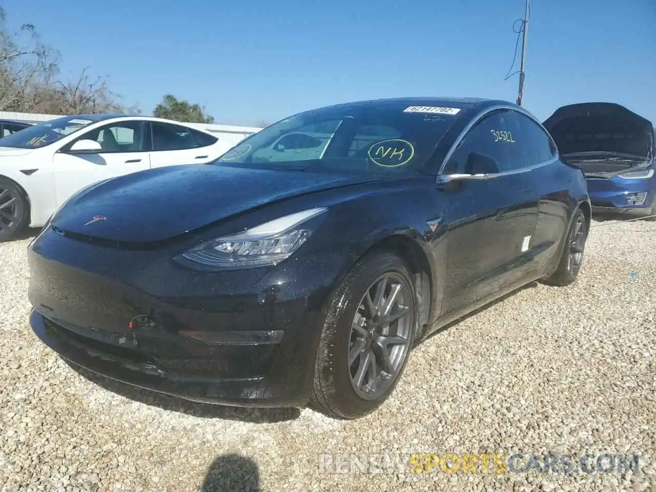 2 Photograph of a damaged car 5YJ3E1EB9LF599579 TESLA MODEL 3 2020