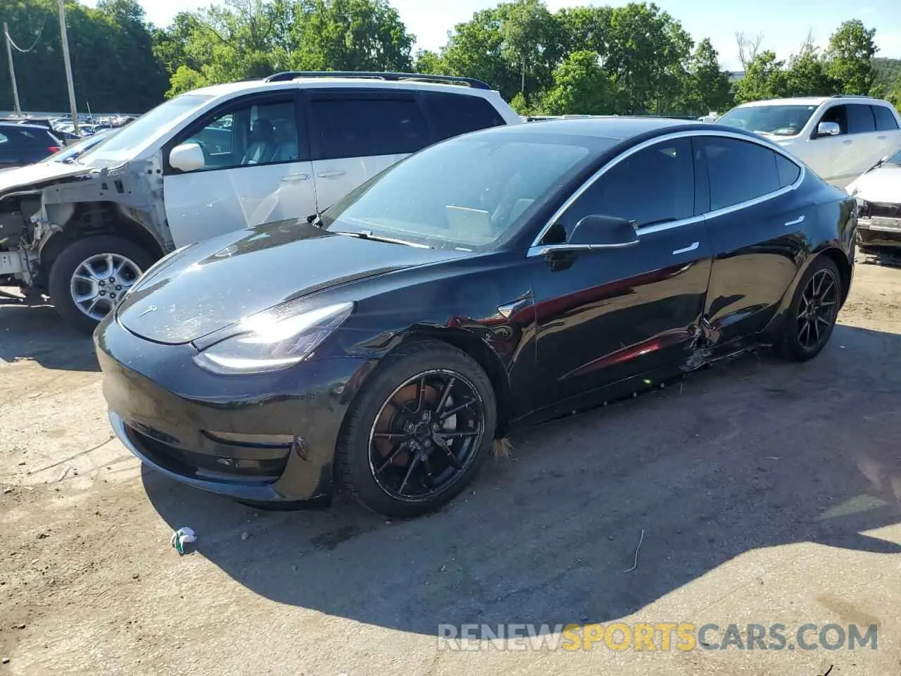 1 Photograph of a damaged car 5YJ3E1EB9LF599873 TESLA MODEL 3 2020