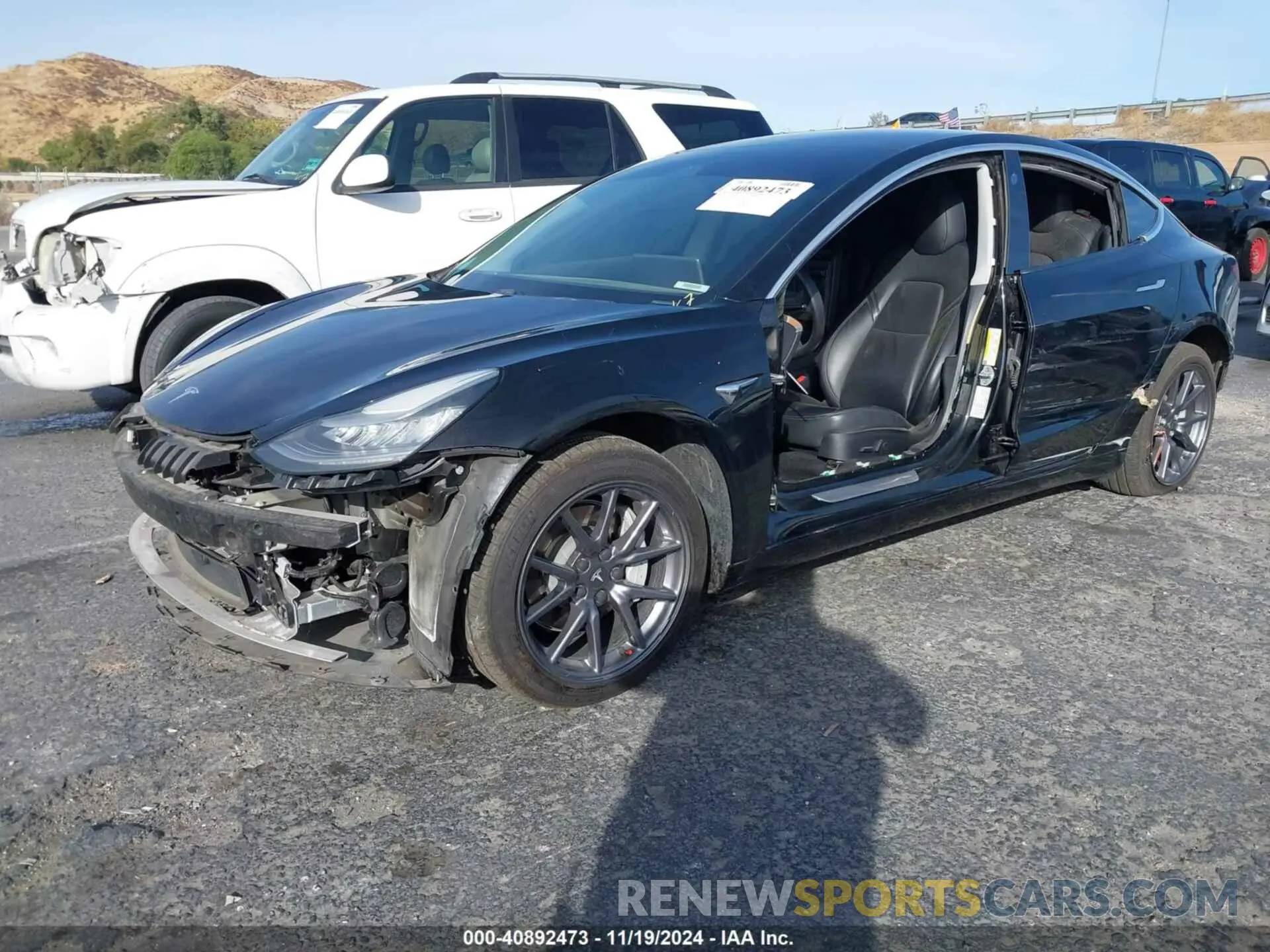 2 Photograph of a damaged car 5YJ3E1EB9LF600049 TESLA MODEL 3 2020