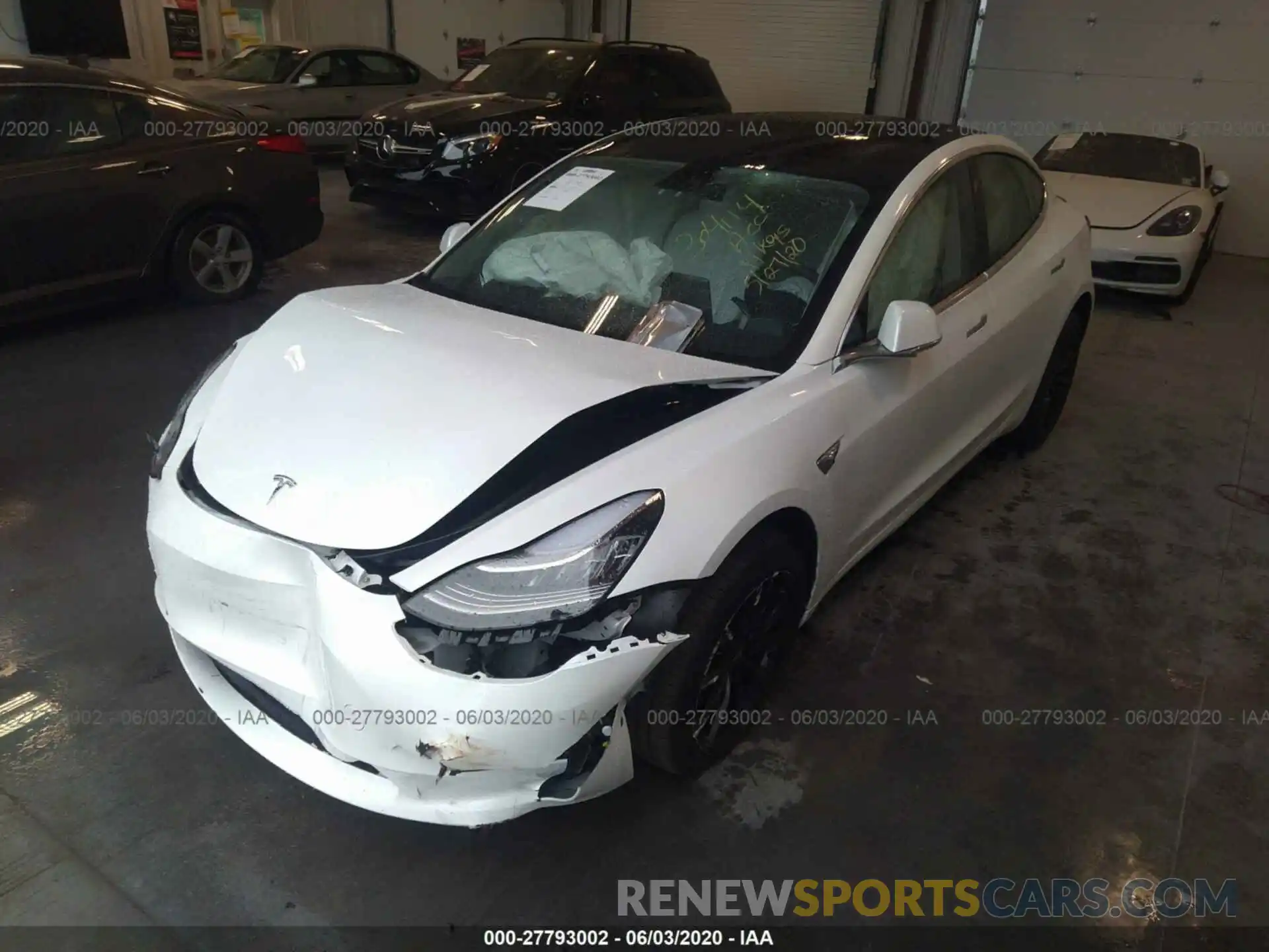 2 Photograph of a damaged car 5YJ3E1EB9LF606949 TESLA MODEL 3 2020