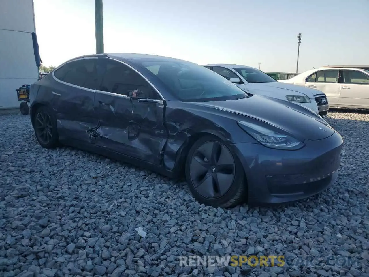4 Photograph of a damaged car 5YJ3E1EB9LF616512 TESLA MODEL 3 2020