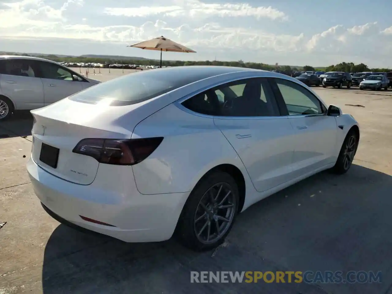 4 Photograph of a damaged car 5YJ3E1EB9LF637005 TESLA MODEL 3 2020