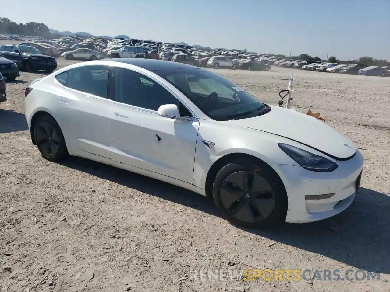 4 Photograph of a damaged car 5YJ3E1EB9LF665032 TESLA MODEL 3 2020