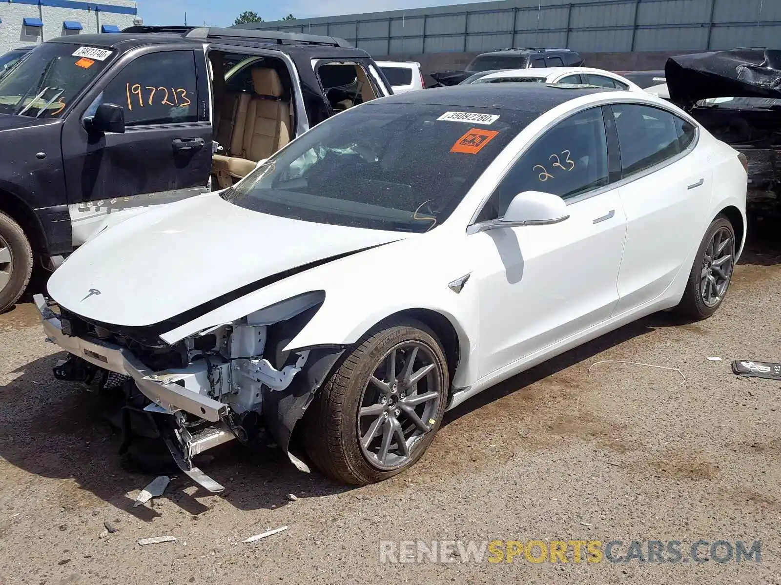 2 Photograph of a damaged car 5YJ3E1EB9LF665175 TESLA MODEL 3 2020