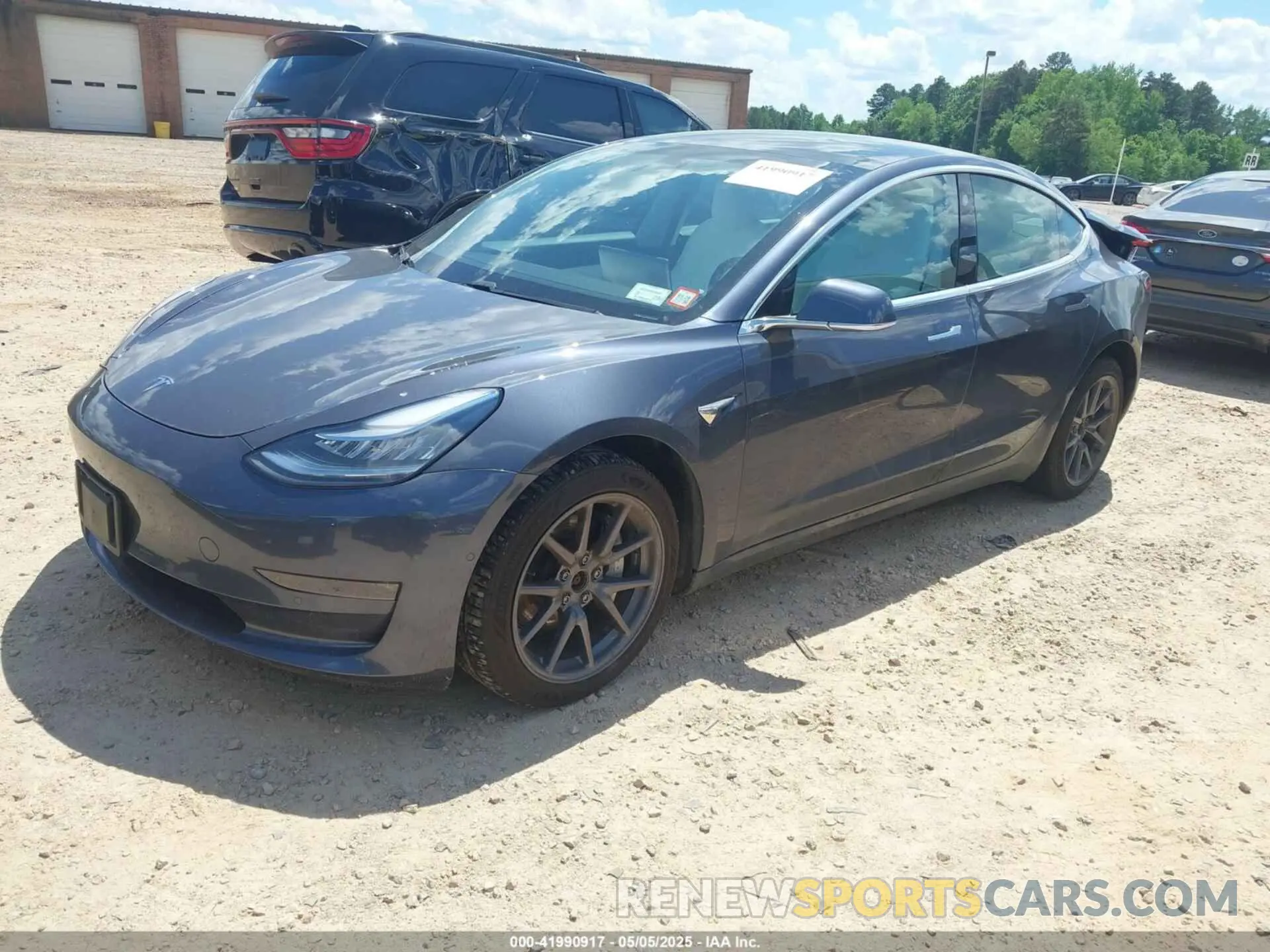 2 Photograph of a damaged car 5YJ3E1EB9LF667993 TESLA MODEL 3 2020