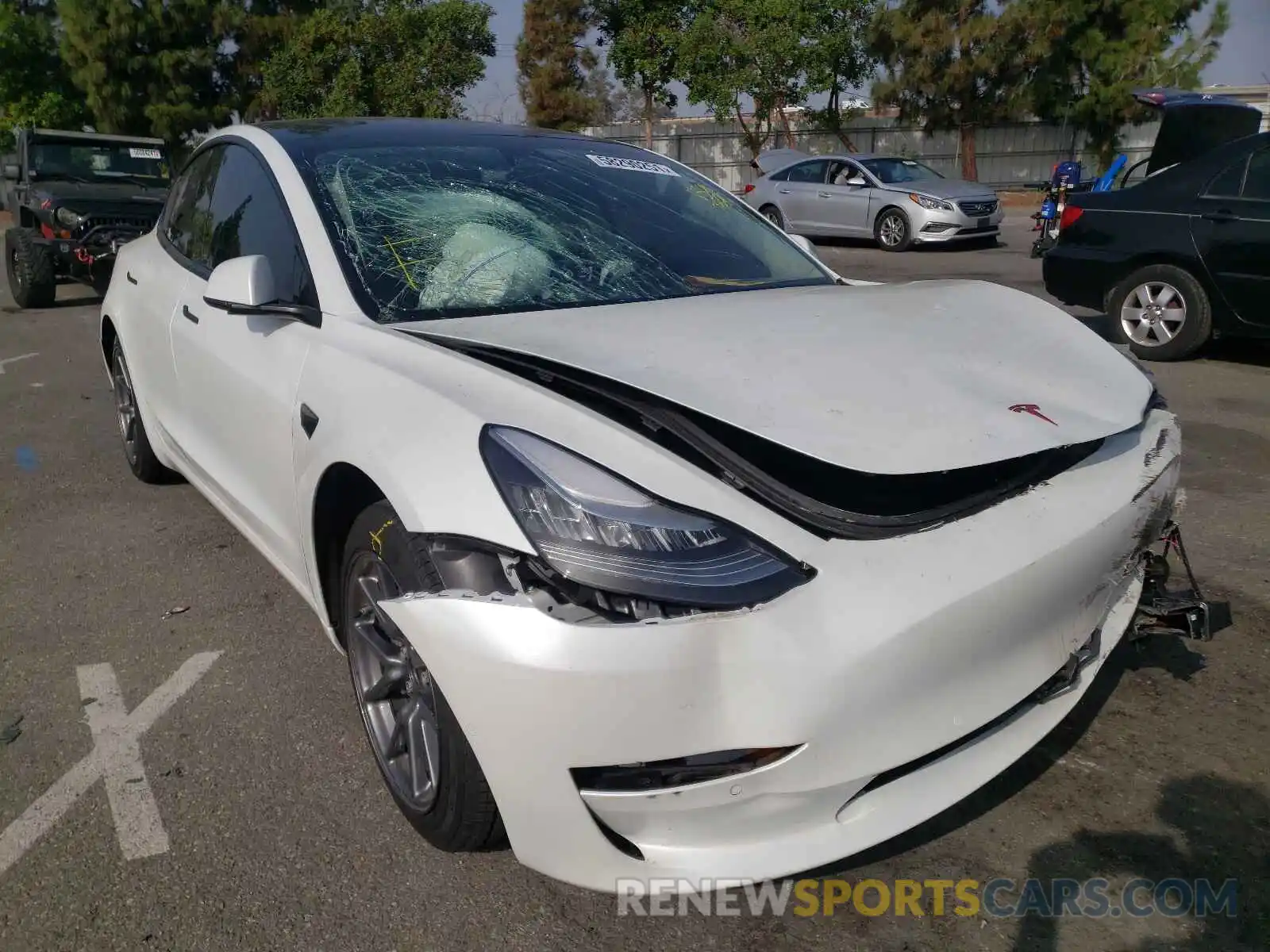 1 Photograph of a damaged car 5YJ3E1EB9LF711510 TESLA MODEL 3 2020