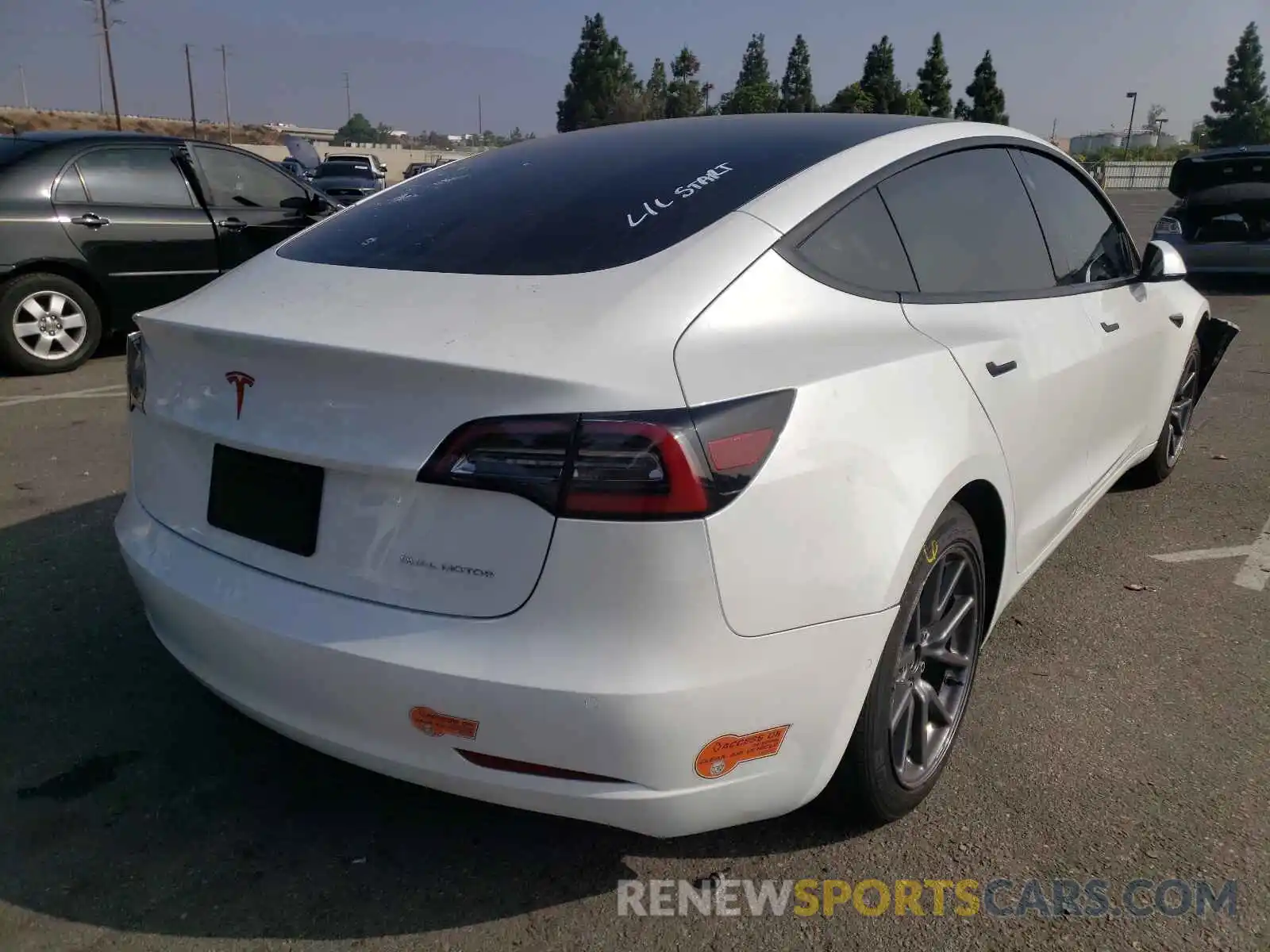 4 Photograph of a damaged car 5YJ3E1EB9LF711510 TESLA MODEL 3 2020