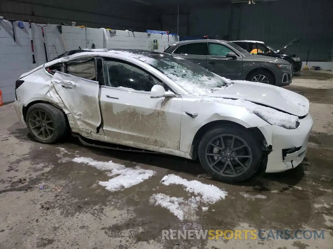 4 Photograph of a damaged car 5YJ3E1EB9LF741624 TESLA MODEL 3 2020