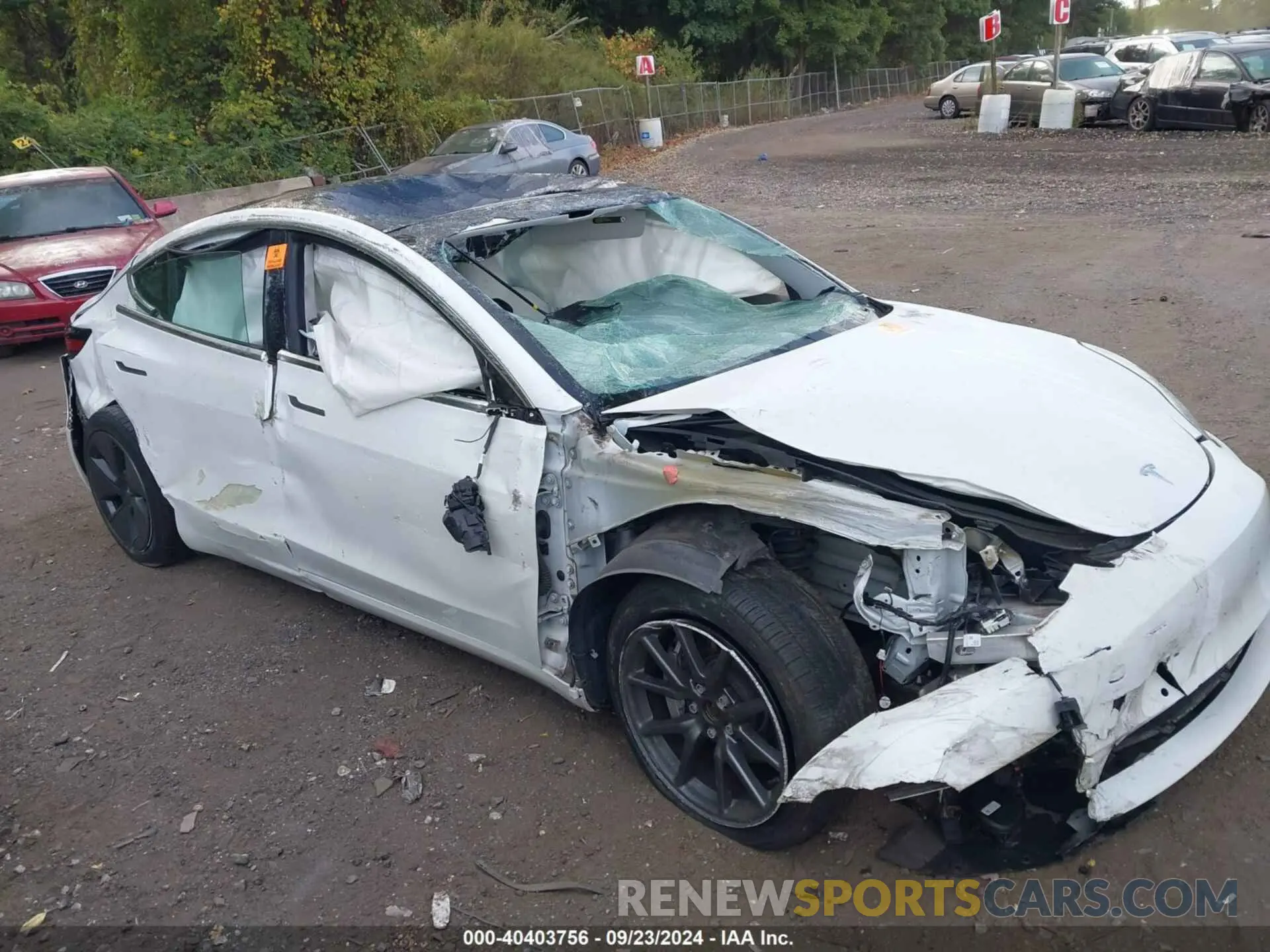 6 Photograph of a damaged car 5YJ3E1EB9LF744717 TESLA MODEL 3 2020