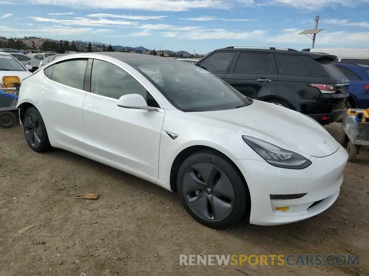 4 Photograph of a damaged car 5YJ3E1EB9LF746483 TESLA MODEL 3 2020