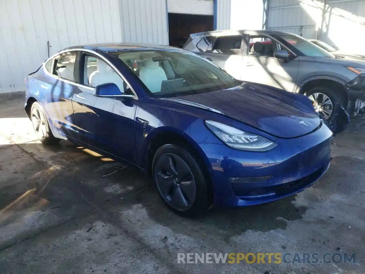 4 Photograph of a damaged car 5YJ3E1EB9LF769701 TESLA MODEL 3 2020