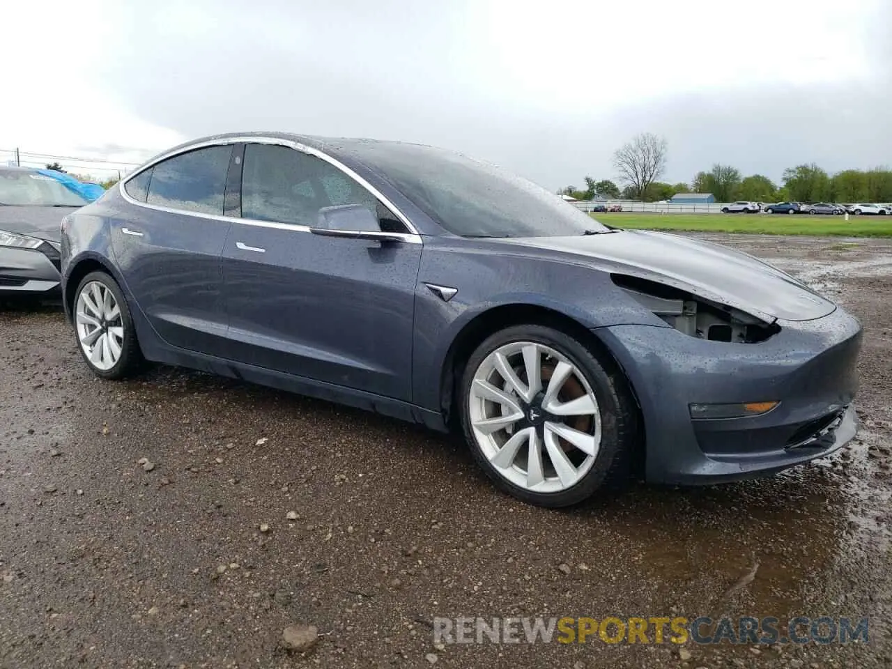 4 Photograph of a damaged car 5YJ3E1EB9LF787406 TESLA MODEL 3 2020
