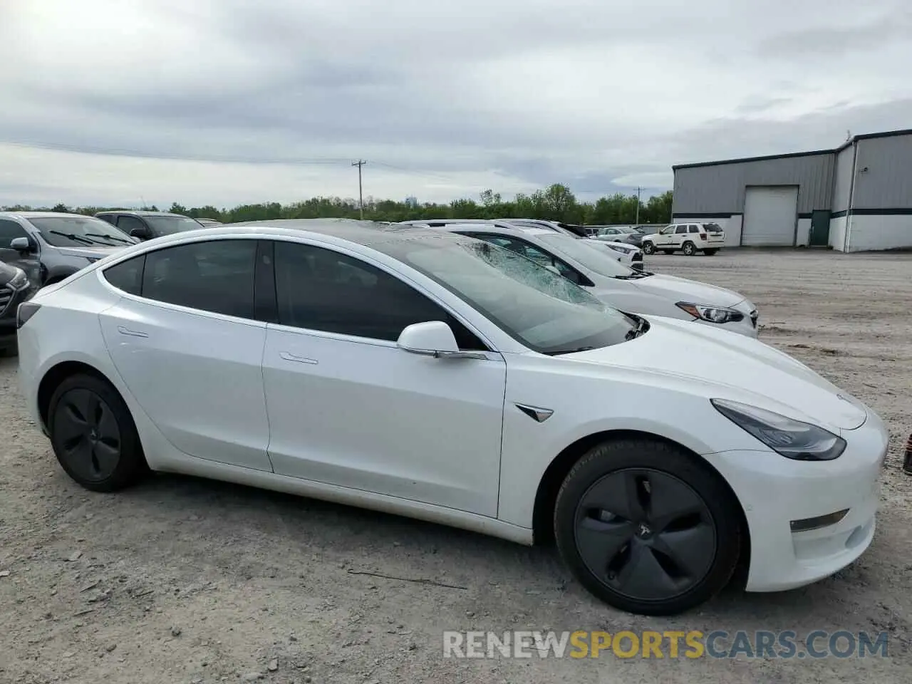 4 Photograph of a damaged car 5YJ3E1EB9LF801059 TESLA MODEL 3 2020