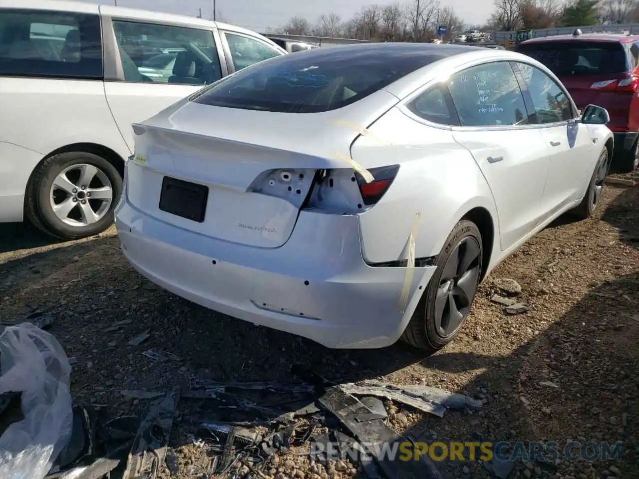 4 Photograph of a damaged car 5YJ3E1EBXLF607009 TESLA MODEL 3 2020