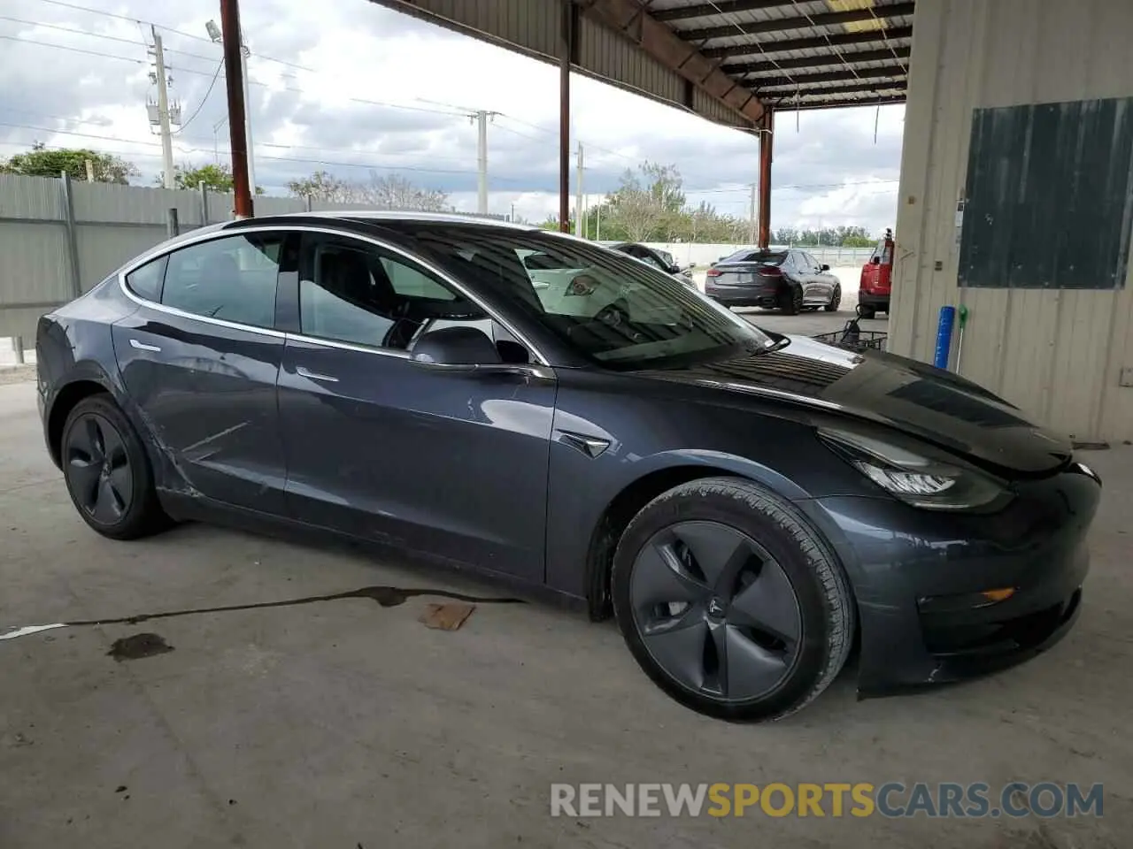 4 Photograph of a damaged car 5YJ3E1EBXLF616390 TESLA MODEL 3 2020