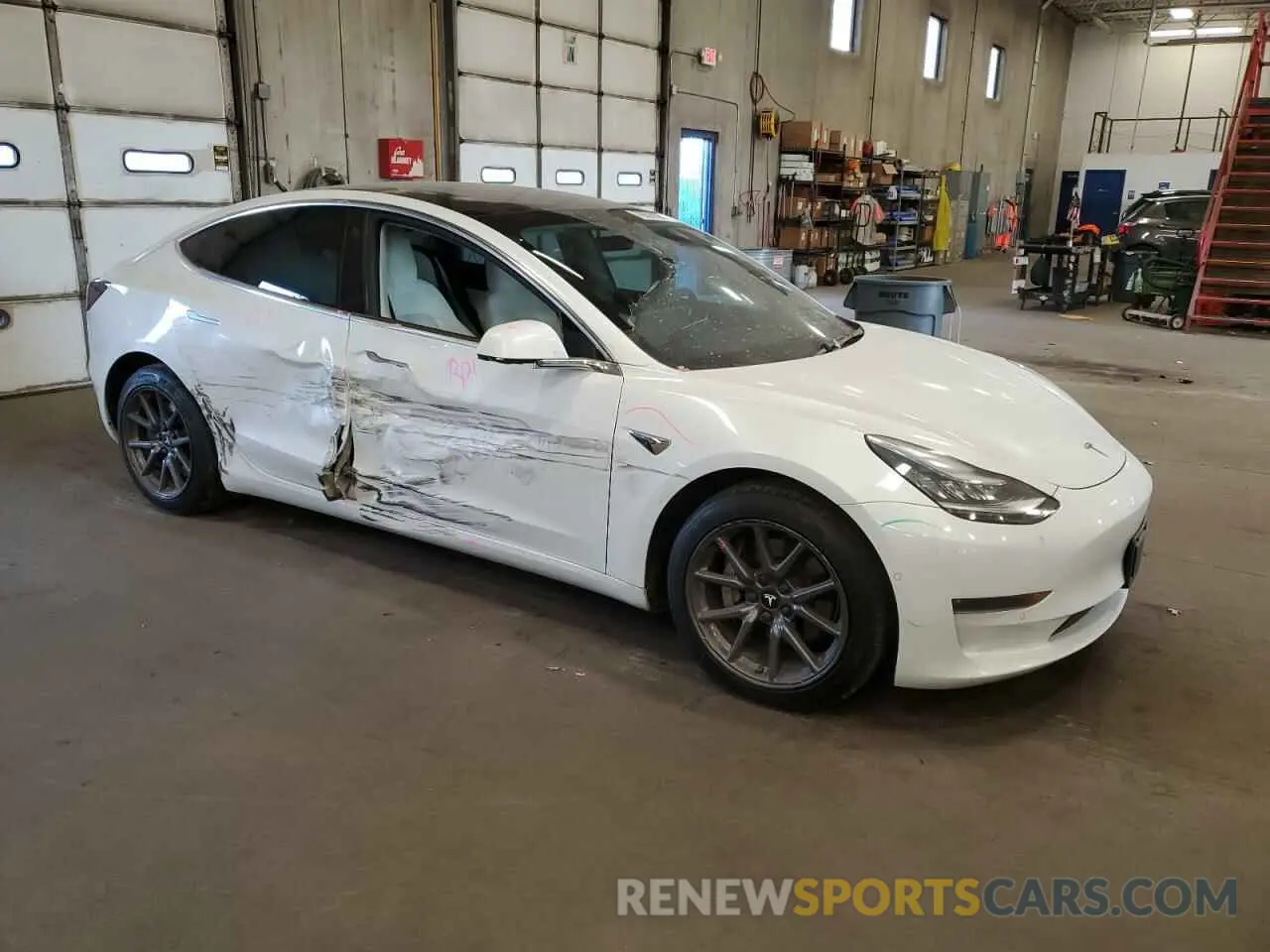 4 Photograph of a damaged car 5YJ3E1EBXLF639670 TESLA MODEL 3 2020