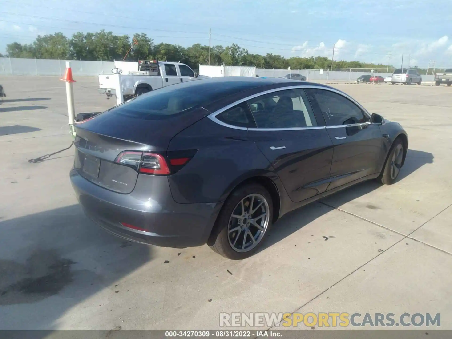 4 Photograph of a damaged car 5YJ3E1EBXLF647543 TESLA MODEL 3 2020