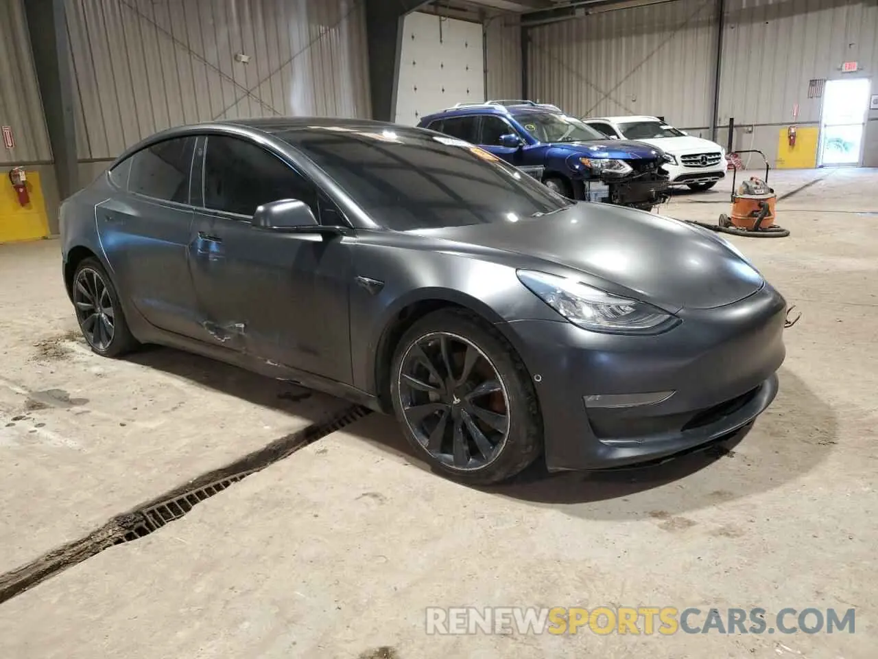 4 Photograph of a damaged car 5YJ3E1EBXLF650801 TESLA MODEL 3 2020