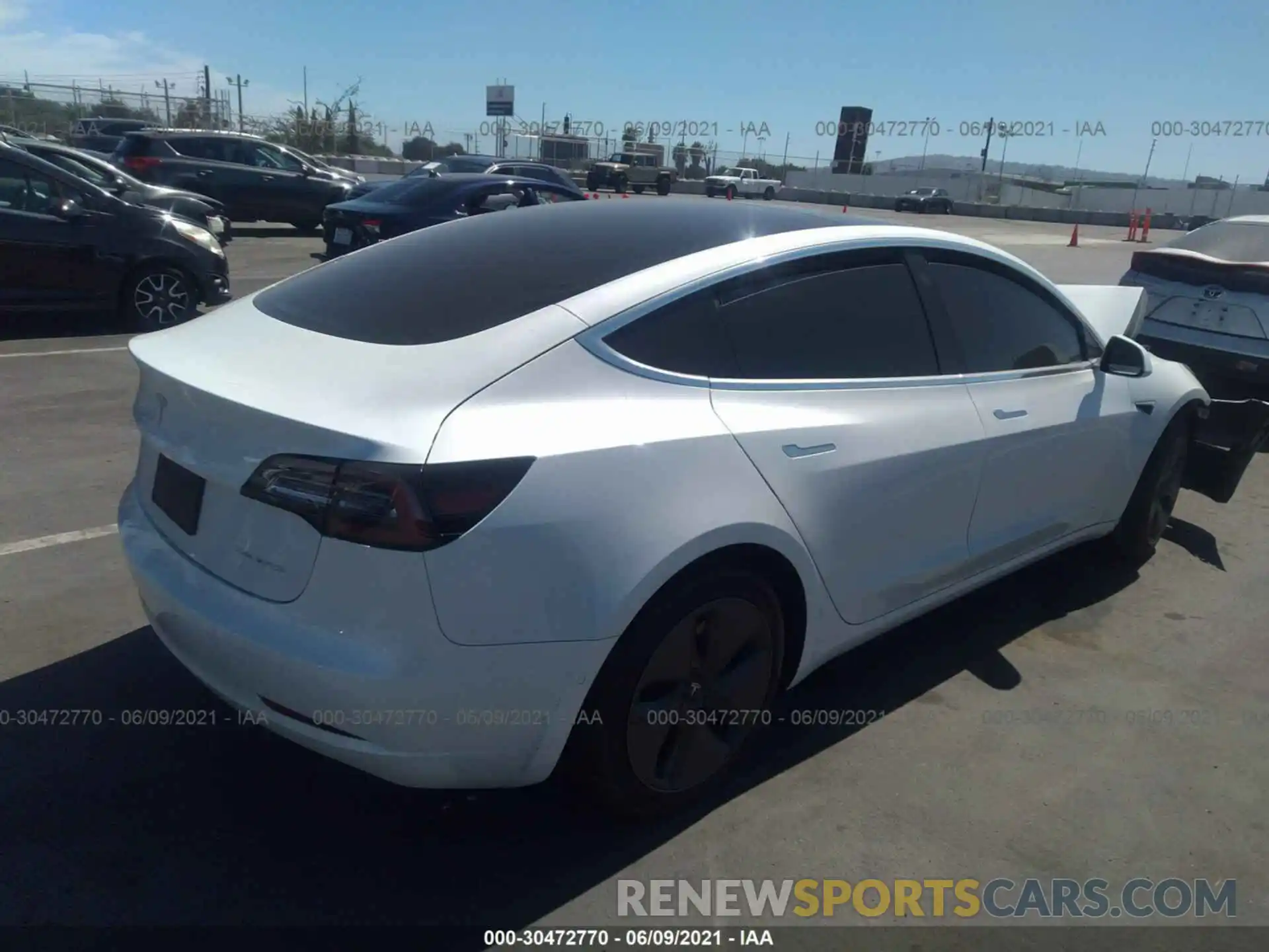 4 Photograph of a damaged car 5YJ3E1EBXLF745424 TESLA MODEL 3 2020