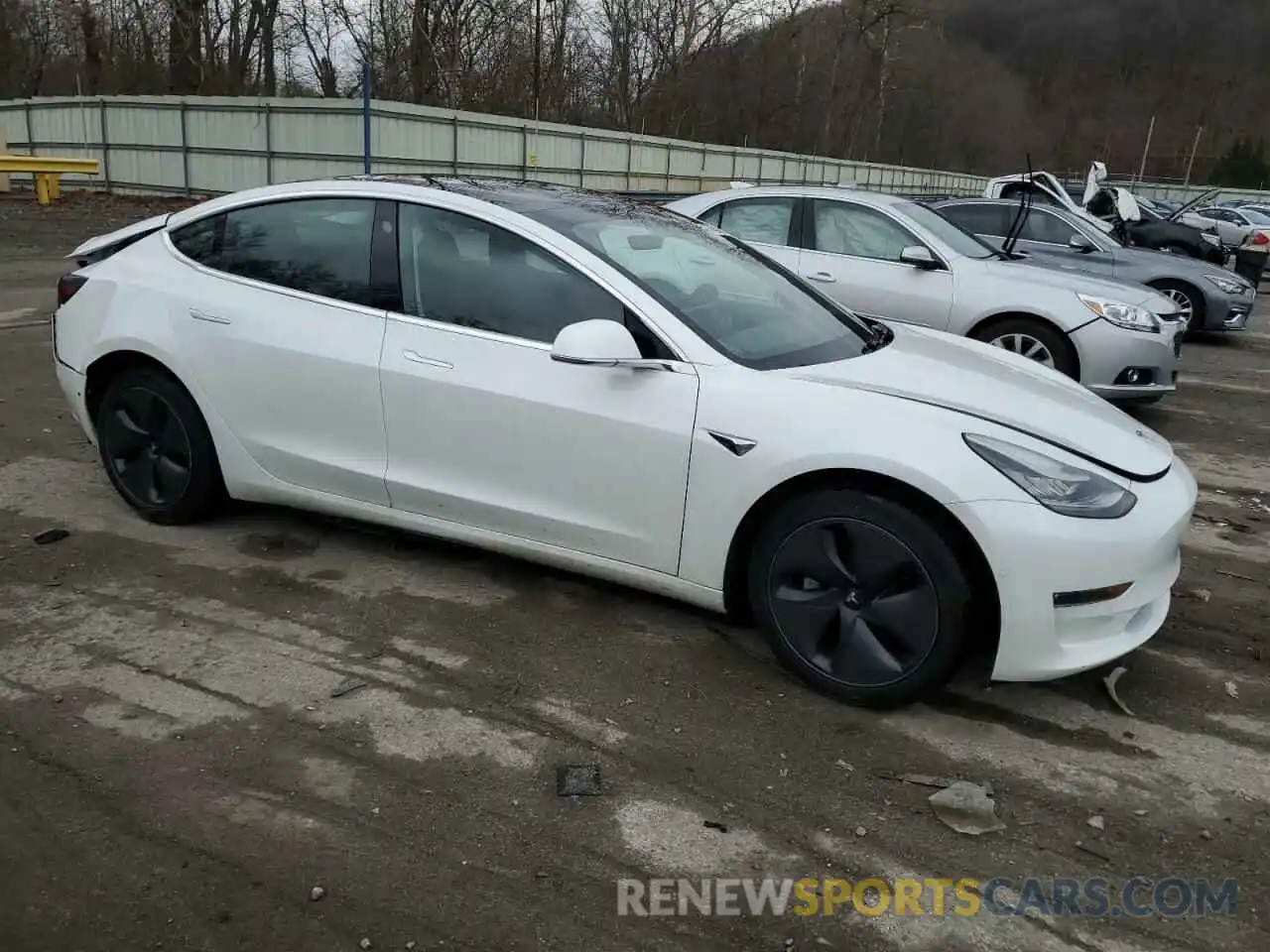 4 Photograph of a damaged car 5YJ3E1EBXLF790668 TESLA MODEL 3 2020