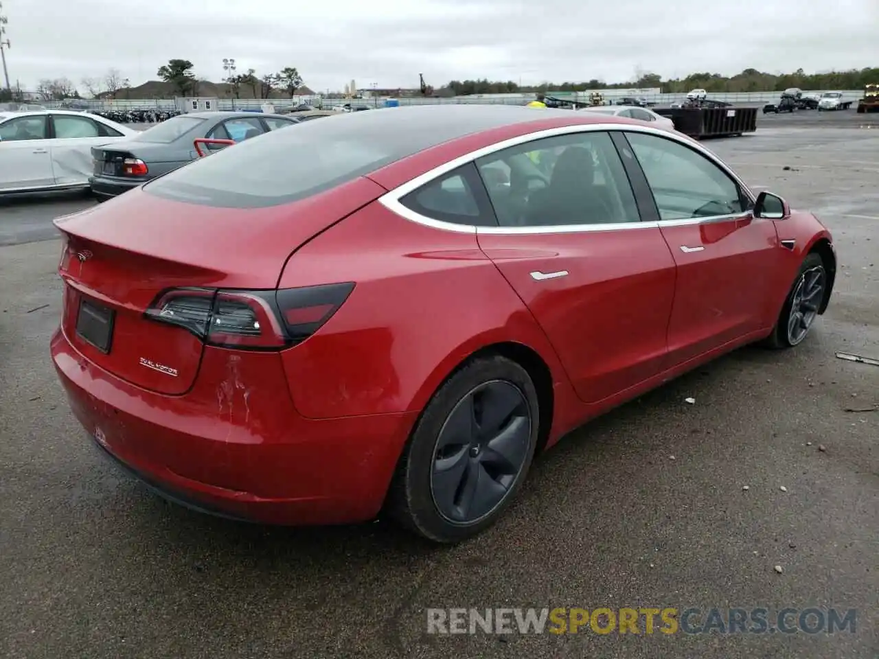 4 Photograph of a damaged car 5YJ3E1EC0LF586406 TESLA MODEL 3 2020