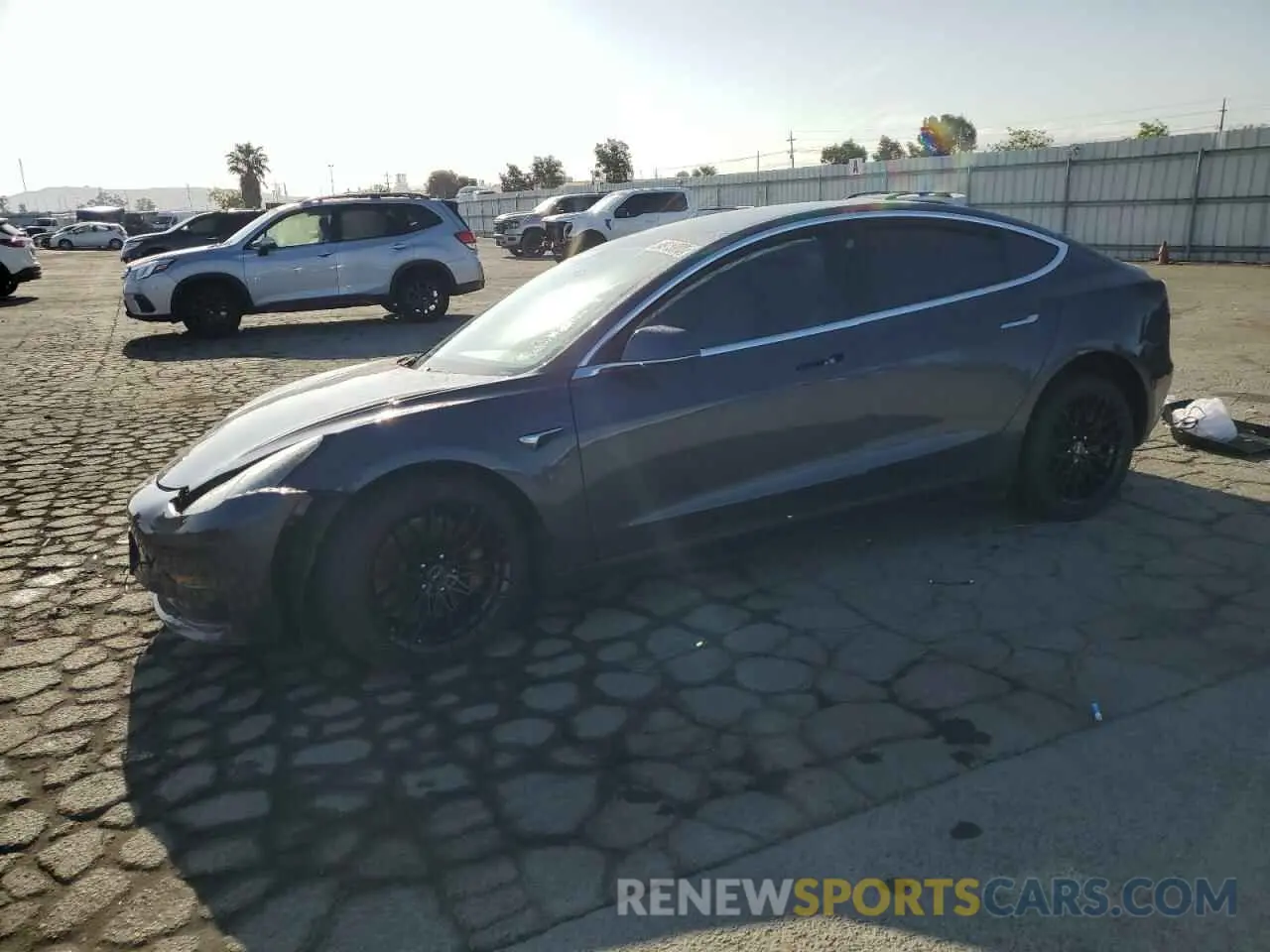1 Photograph of a damaged car 5YJ3E1EC0LF714594 TESLA MODEL 3 2020