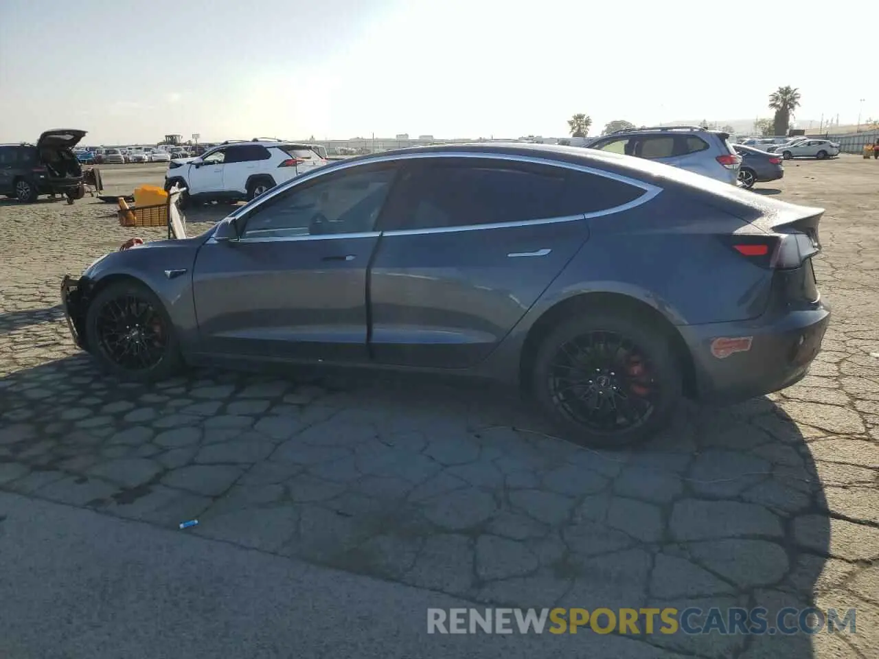 2 Photograph of a damaged car 5YJ3E1EC0LF714594 TESLA MODEL 3 2020