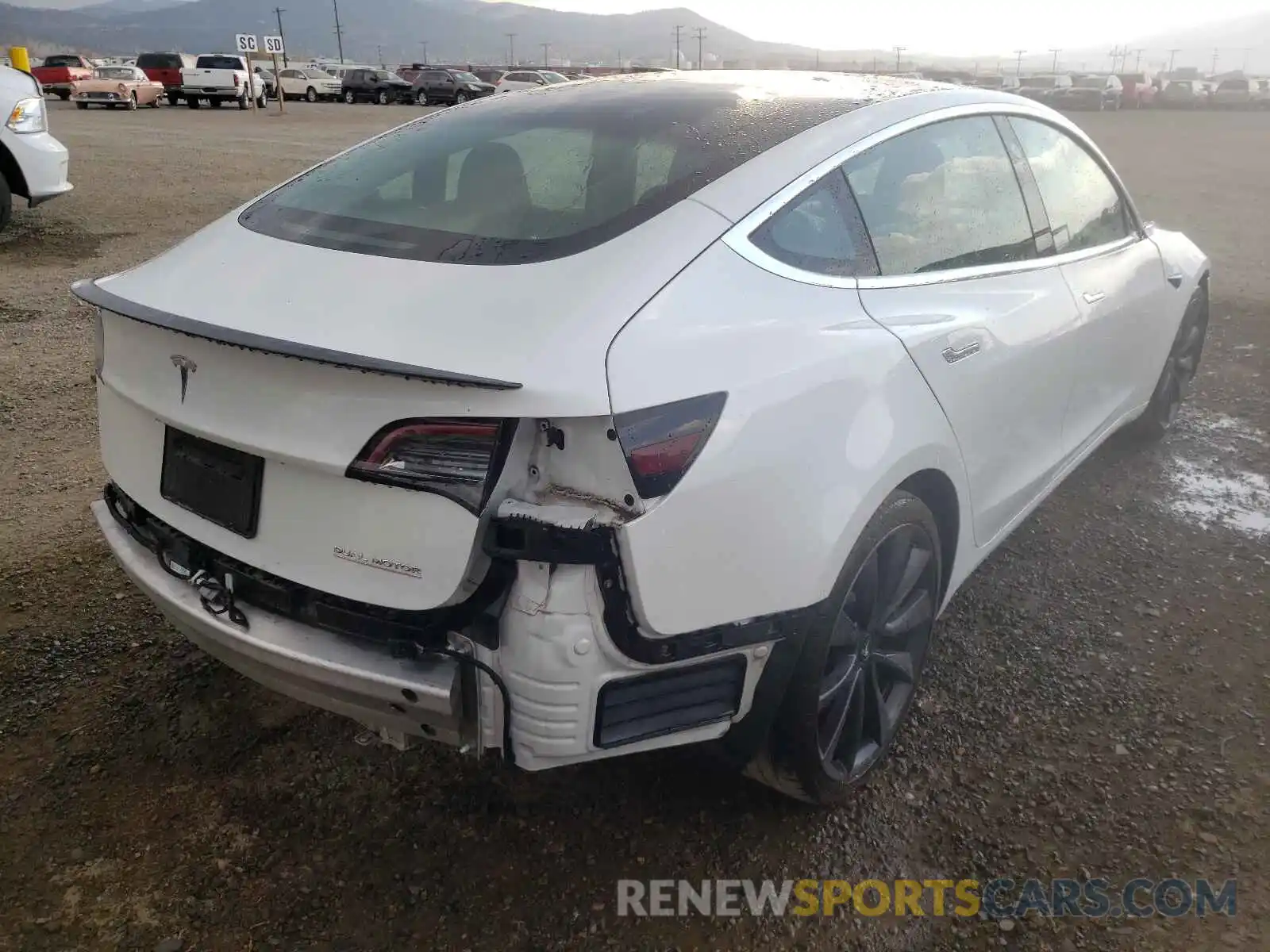 4 Photograph of a damaged car 5YJ3E1EC1LF623883 TESLA MODEL 3 2020