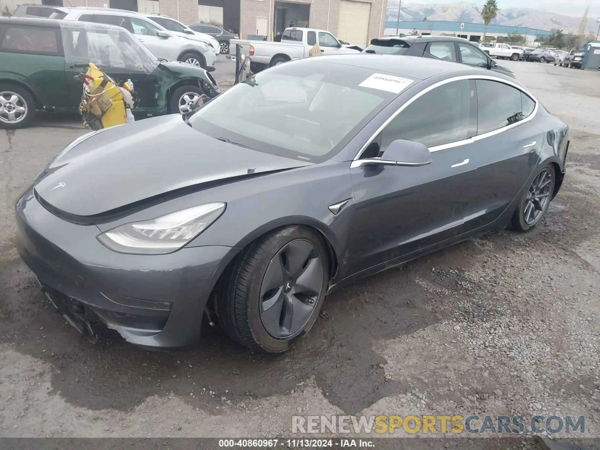2 Photograph of a damaged car 5YJ3E1EC2LF601732 TESLA MODEL 3 2020