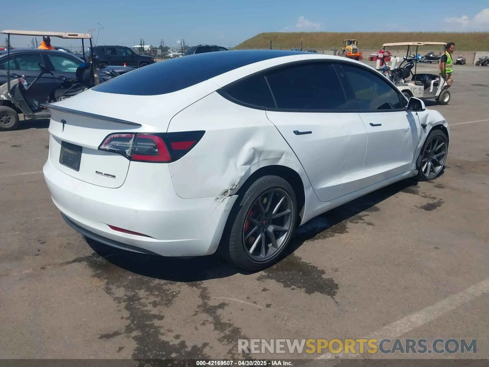 4 Photograph of a damaged car 5YJ3E1EC2LF601990 TESLA MODEL 3 2020