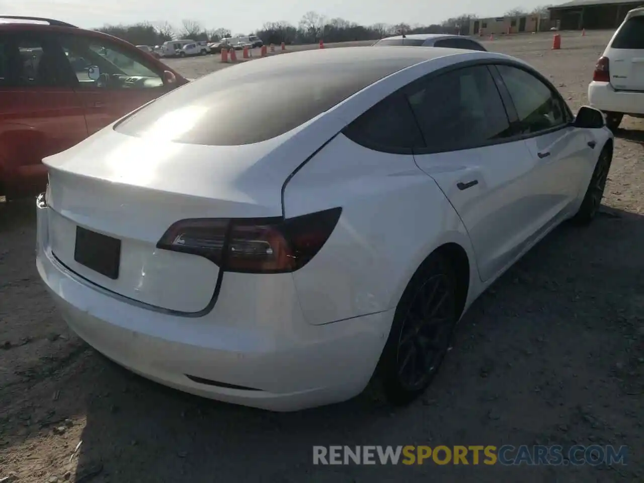 4 Photograph of a damaged car 5YJ3E1EC2LF602668 TESLA MODEL 3 2020