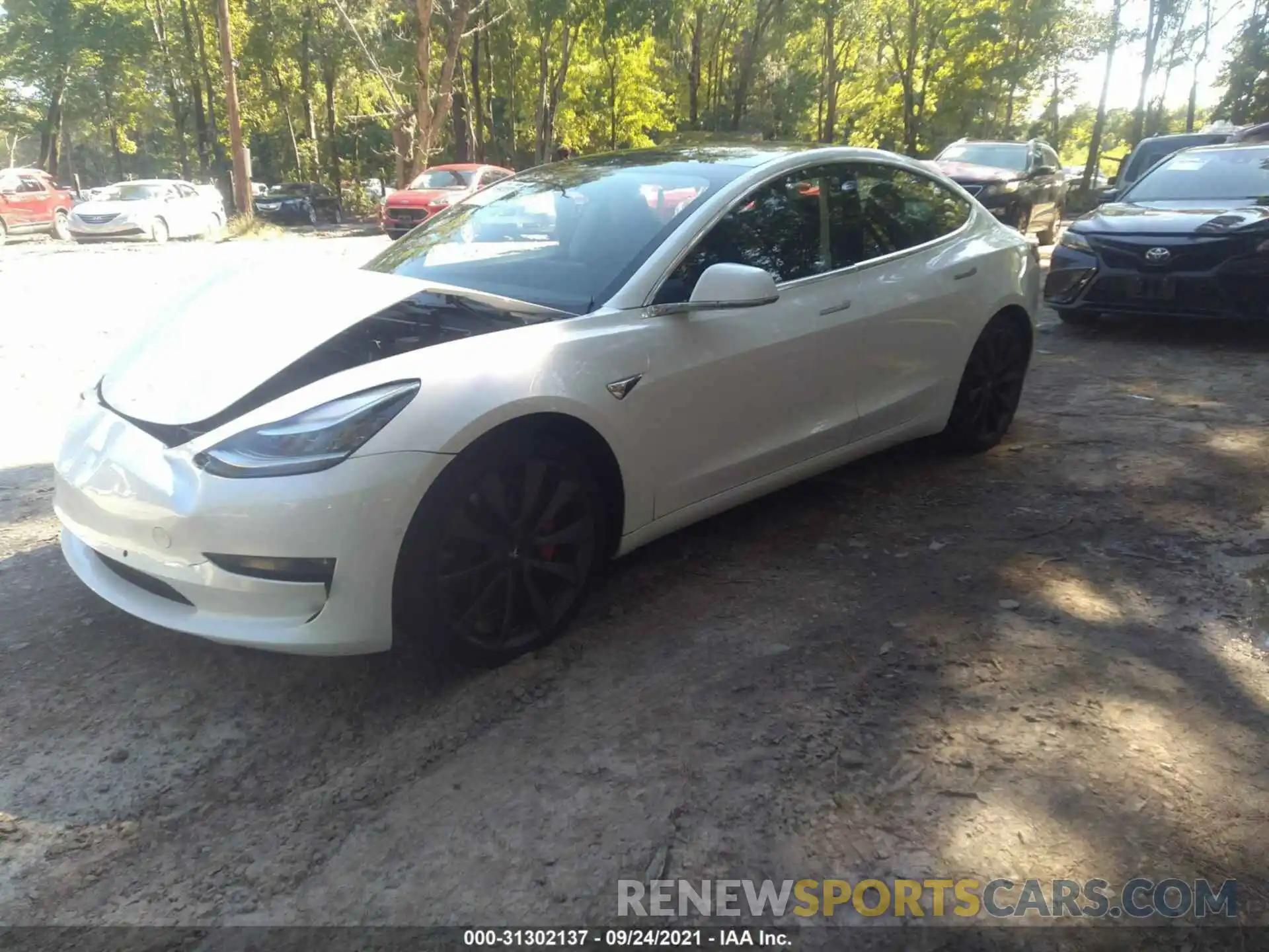 2 Photograph of a damaged car 5YJ3E1EC2LF603254 TESLA MODEL 3 2020