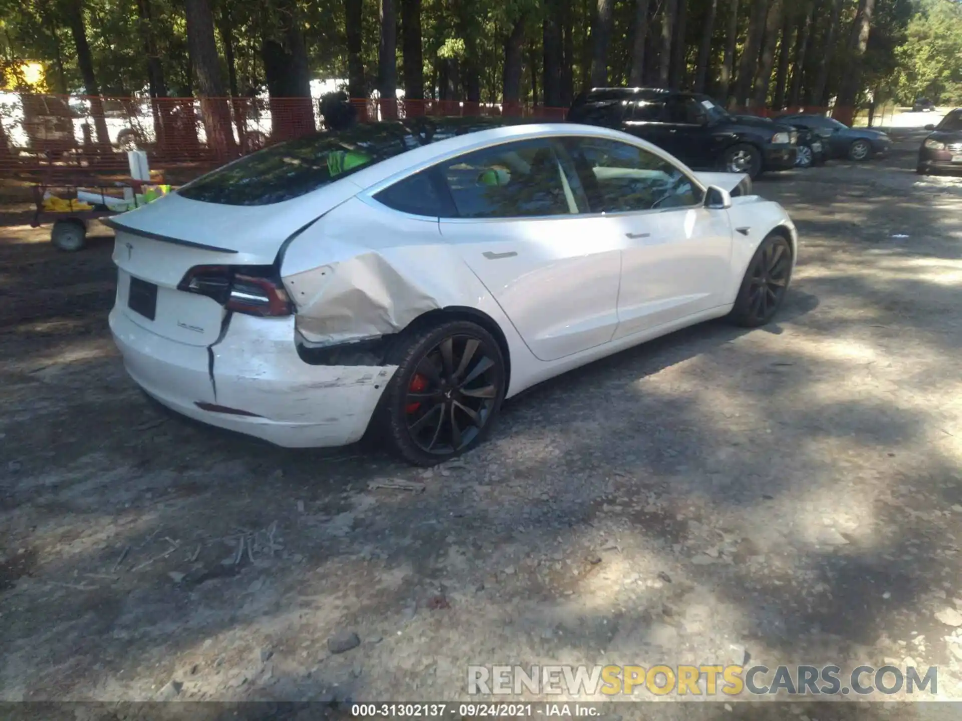 4 Photograph of a damaged car 5YJ3E1EC2LF603254 TESLA MODEL 3 2020