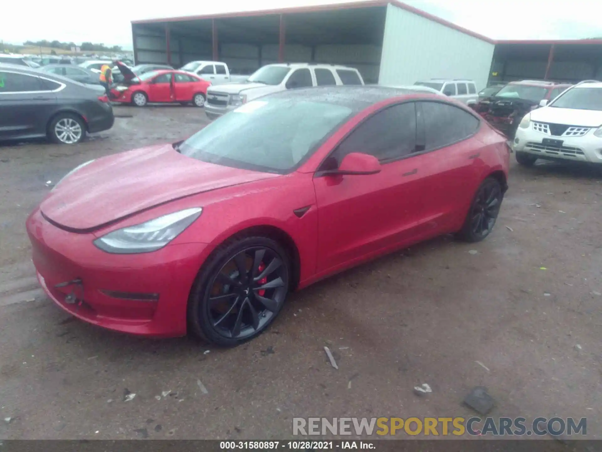 2 Photograph of a damaged car 5YJ3E1EC2LF603447 TESLA MODEL 3 2020