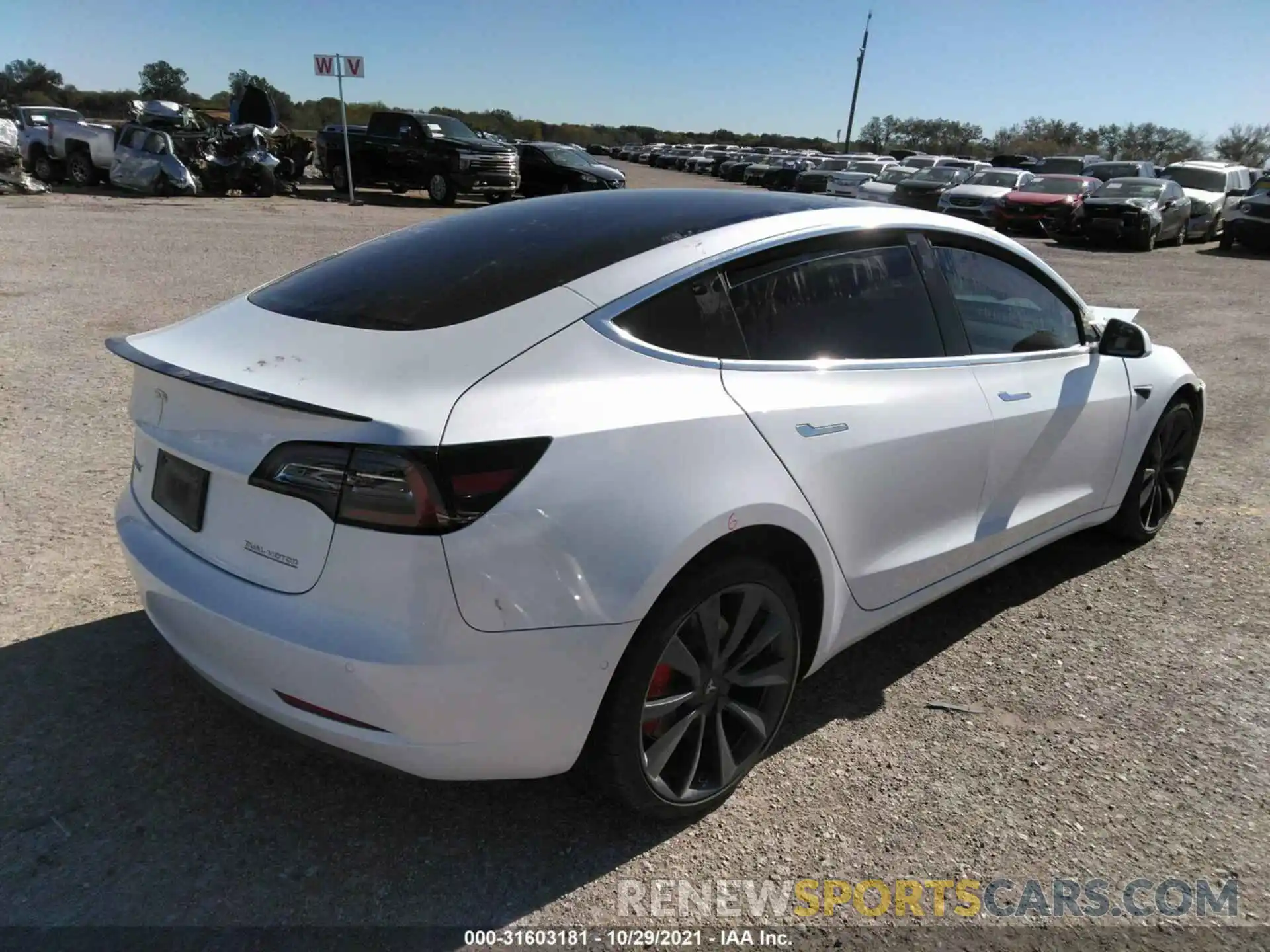 4 Photograph of a damaged car 5YJ3E1EC2LF623407 TESLA MODEL 3 2020