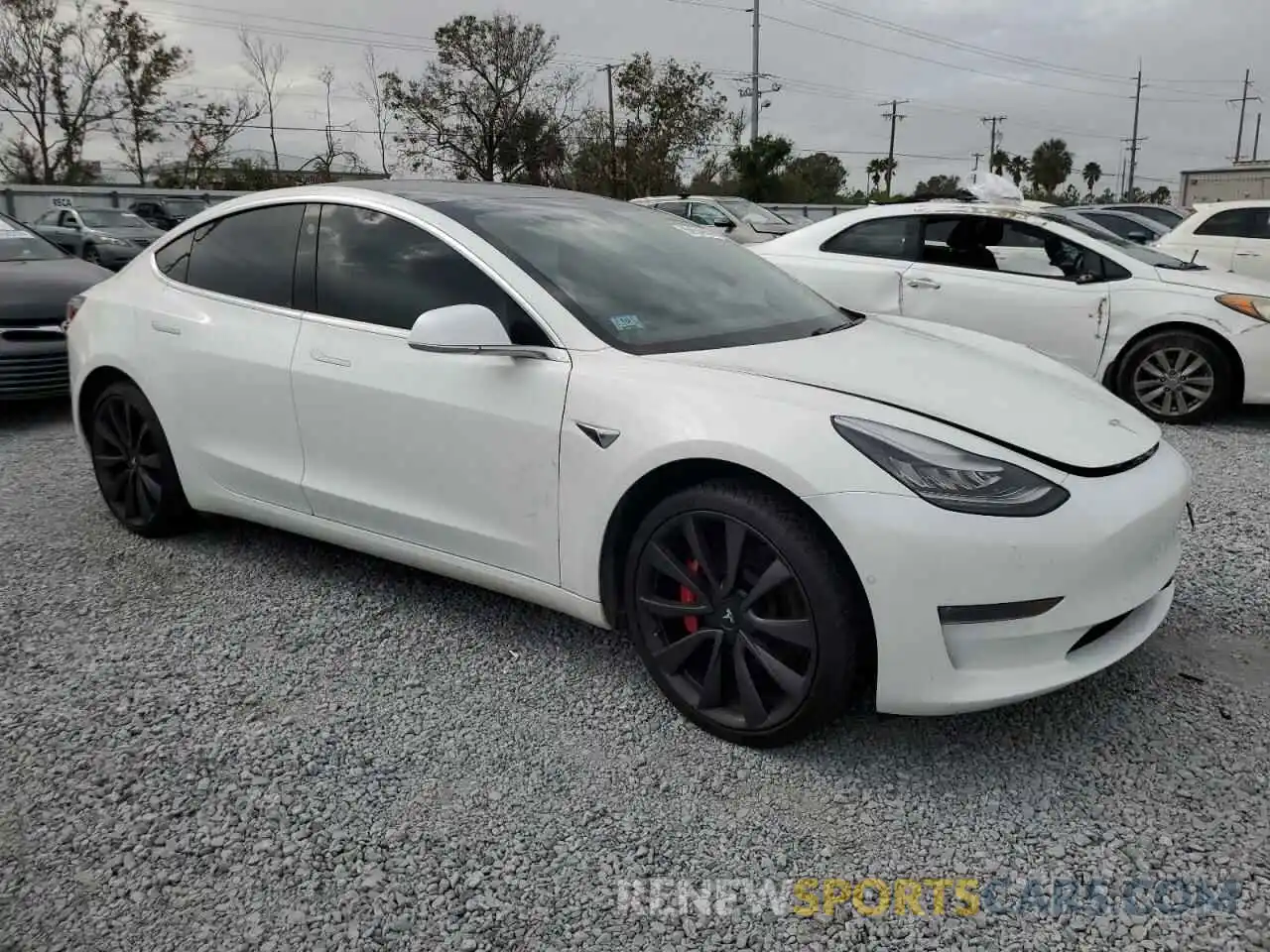 4 Photograph of a damaged car 5YJ3E1EC2LF624654 TESLA MODEL 3 2020