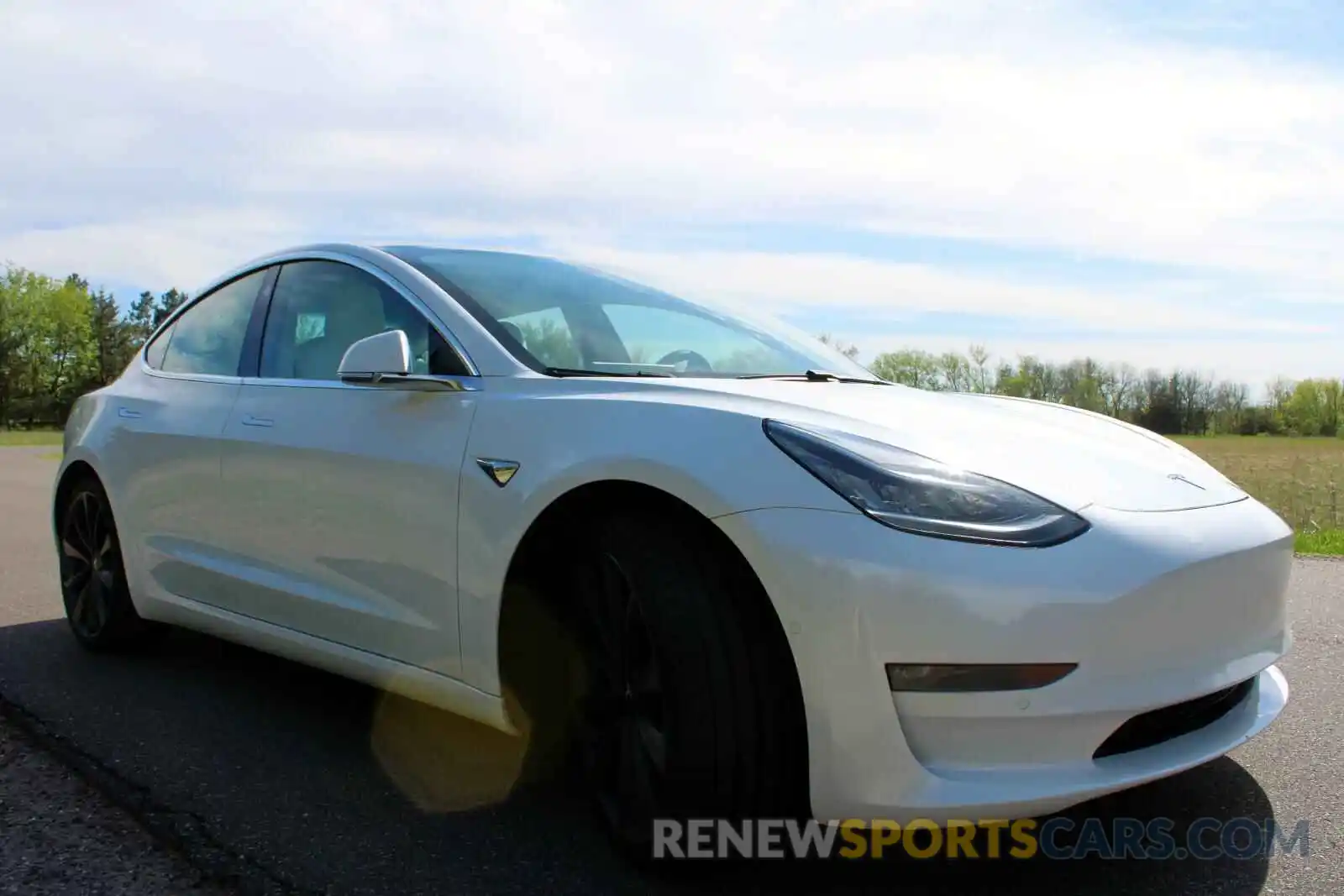 1 Photograph of a damaged car 5YJ3E1EC2LF738928 TESLA MODEL 3 2020