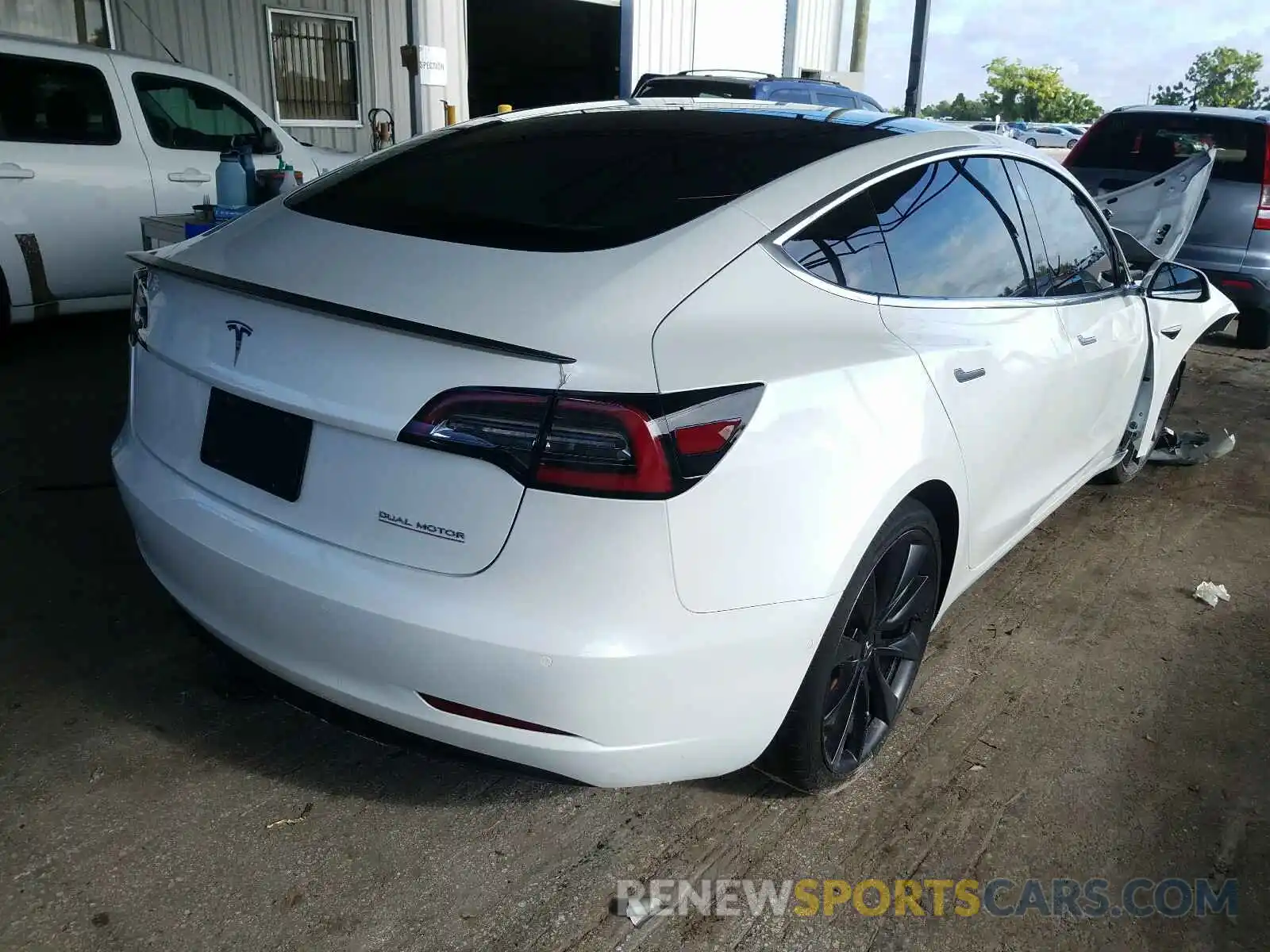 4 Photograph of a damaged car 5YJ3E1EC3LF642032 TESLA MODEL 3 2020